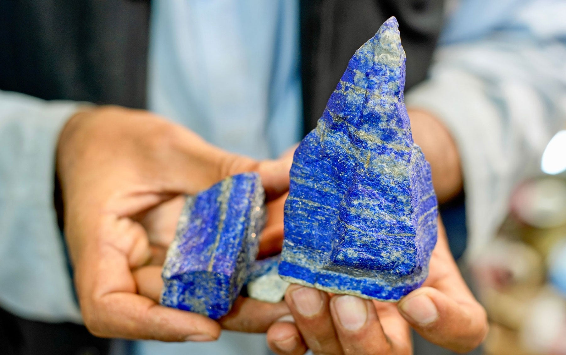 lapis lazuli raw stone in hands