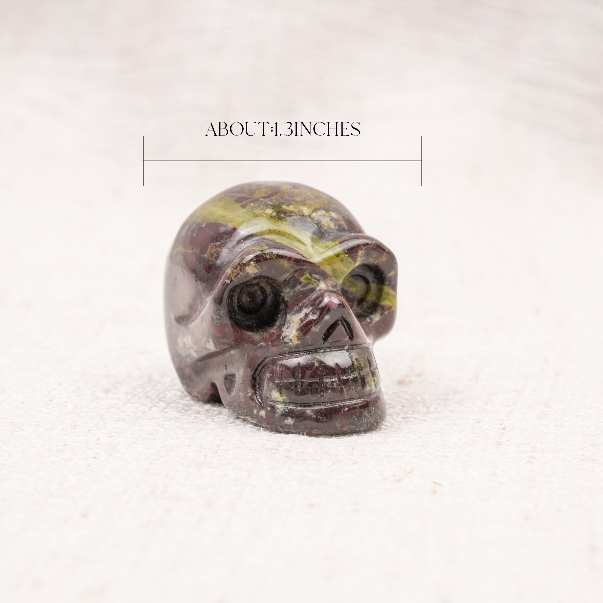Dragon Blood Stone Mini Skull Carving