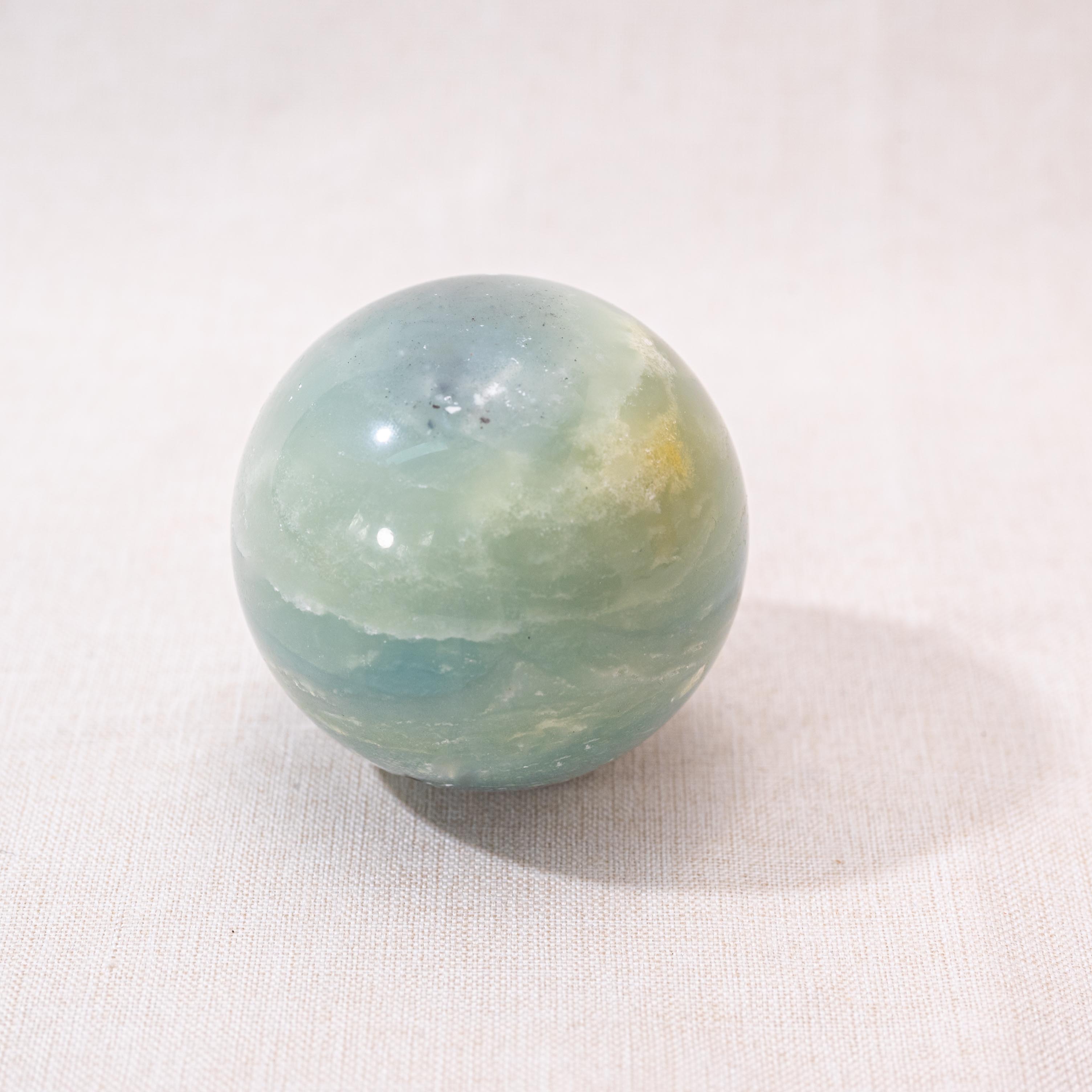 Amazonite sphere with vibrant hues, ideal for crystal healing