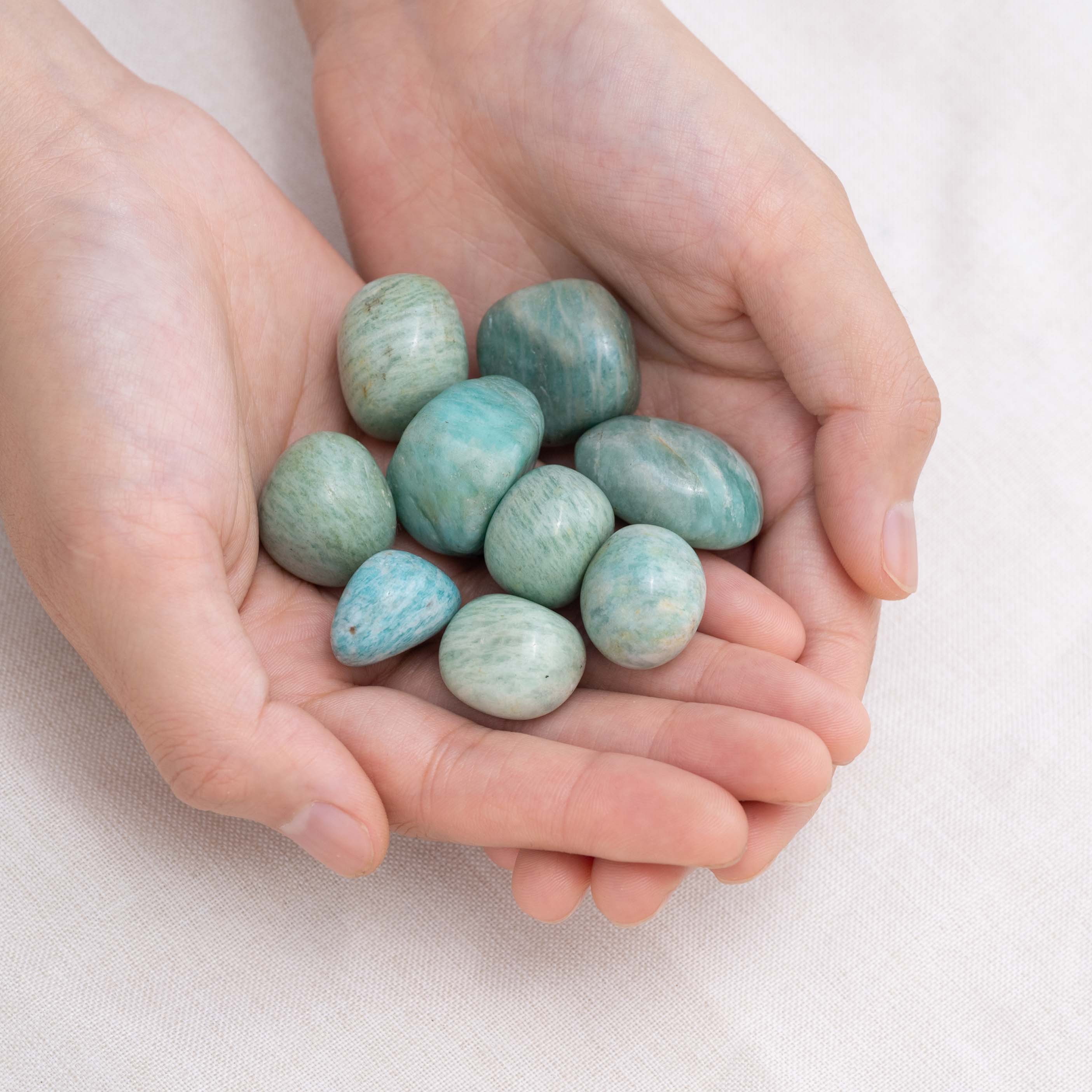 Detail shot of Amazonite tumbled stone's soothing hues