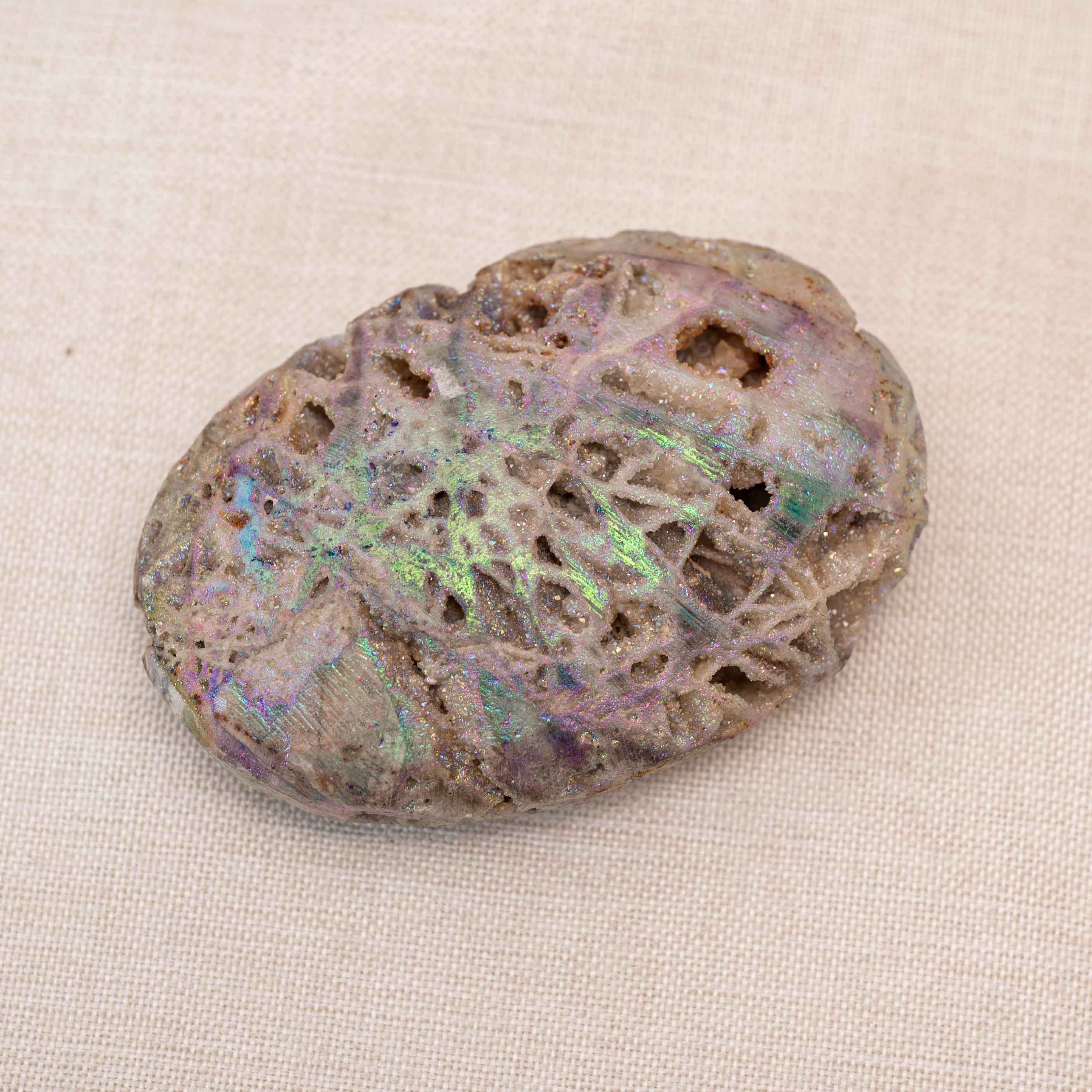 Colorful Aura Sphalerite Palm Stone with iridescent finish reflecting multiple colors