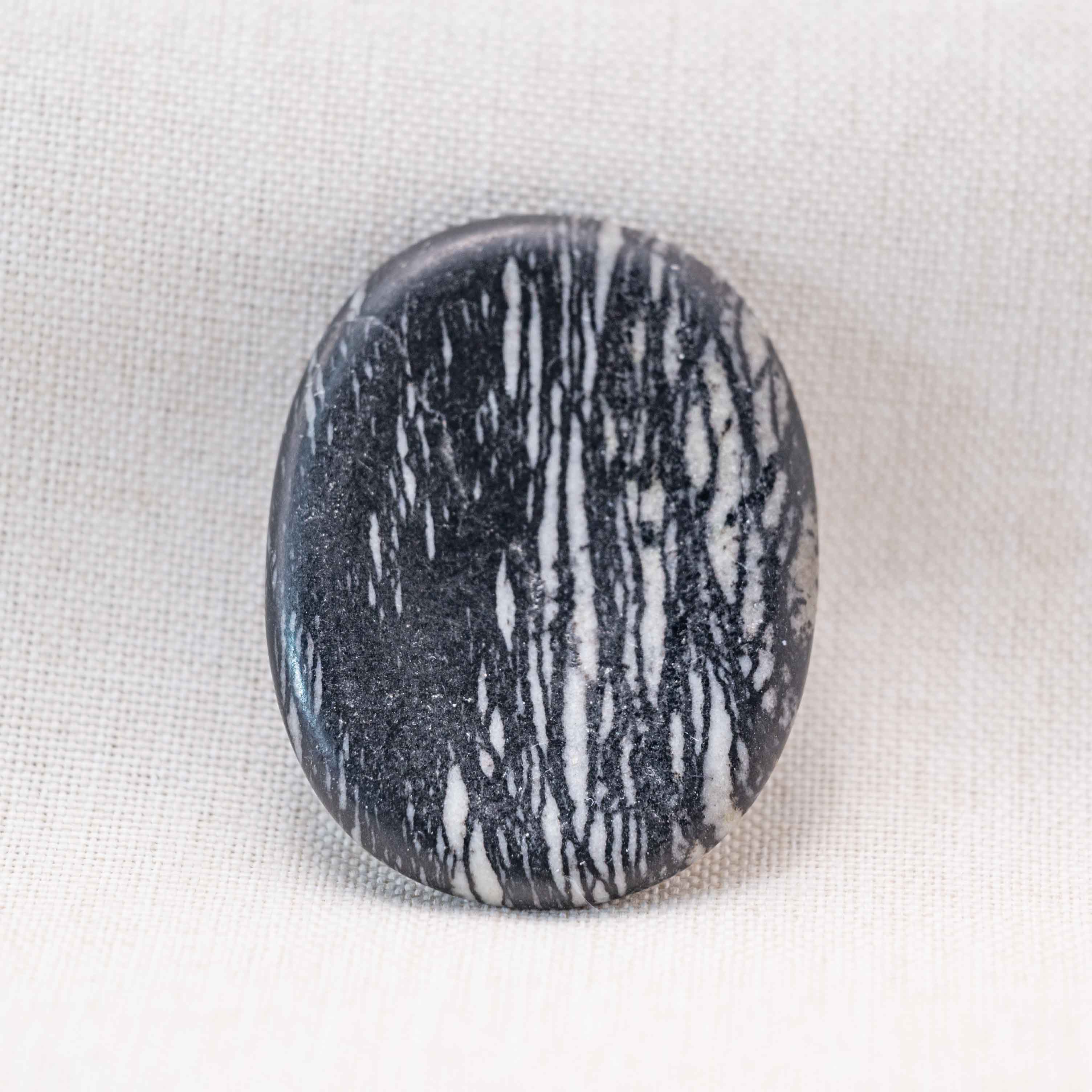 The Black Net Worry Stone offers powerful grounding energy, perfect for reducing stress and anxiety