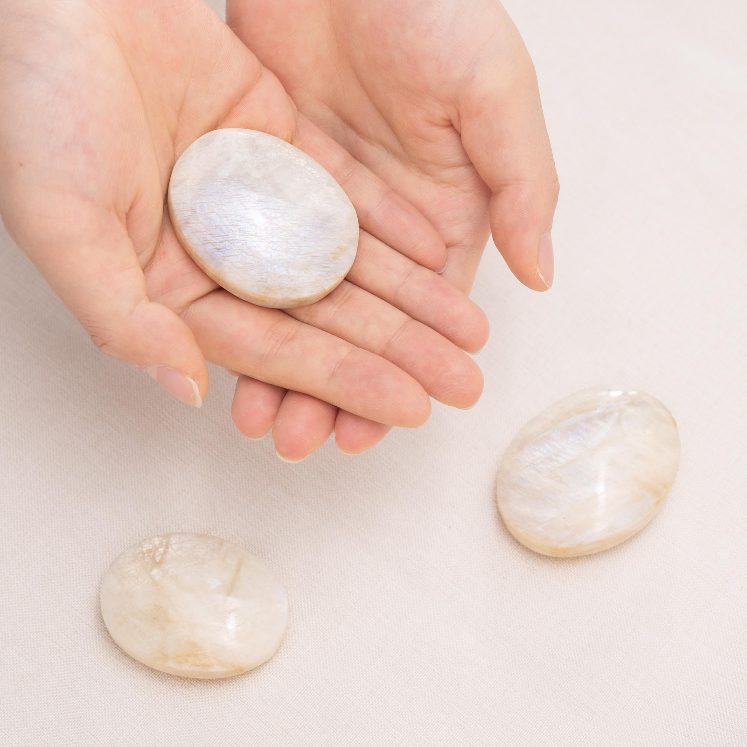 Natural Blue Moonstone Palmstone with feminine energy for personal healing
