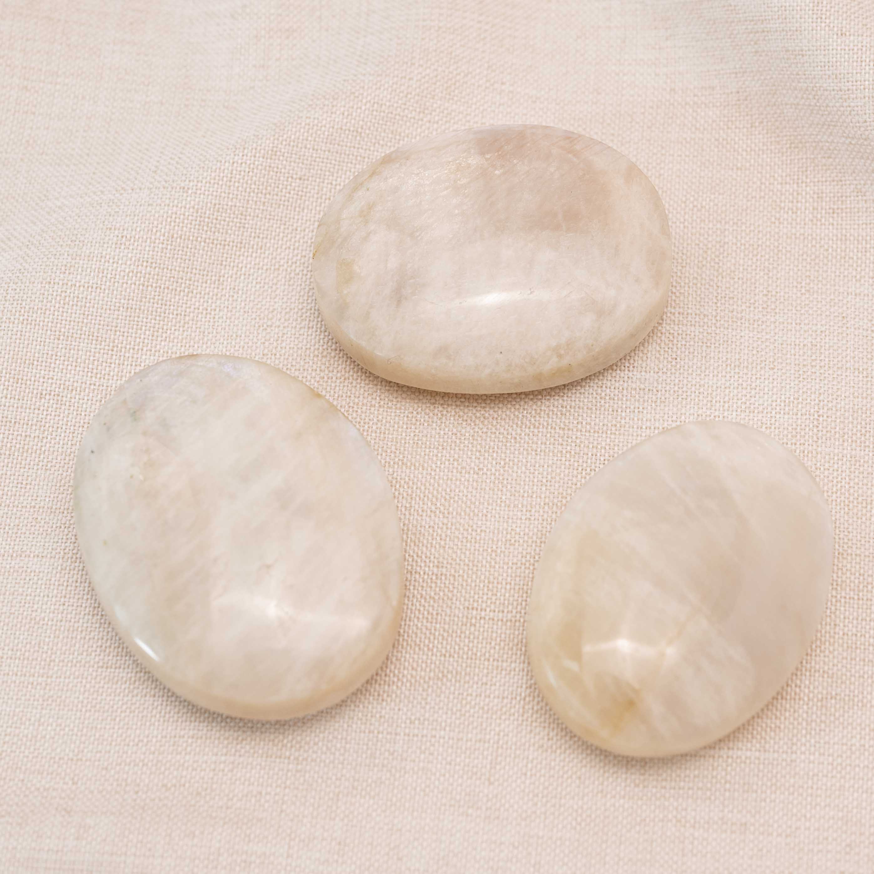Luminous Blue Moonstone Palmstone enhancing intuition and emotional balance