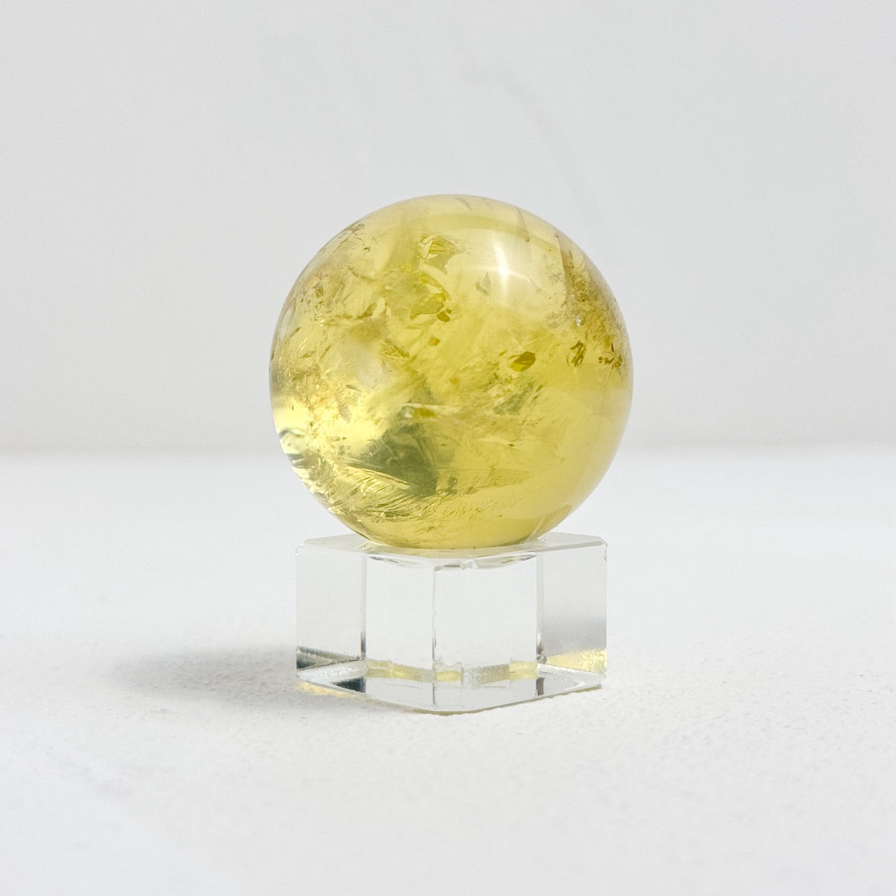 Place the citrine sphere in the wealth corner of your home or office to attract wealth and success. The wealth corner is typically the farthest diagonal from the entrance or room.