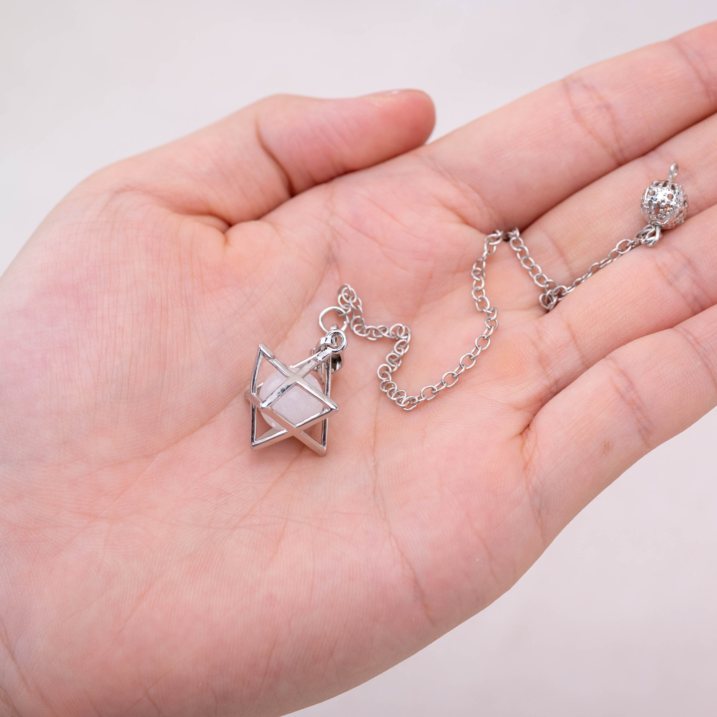 Clear Quartz Merkaba pendulum enhancing energy