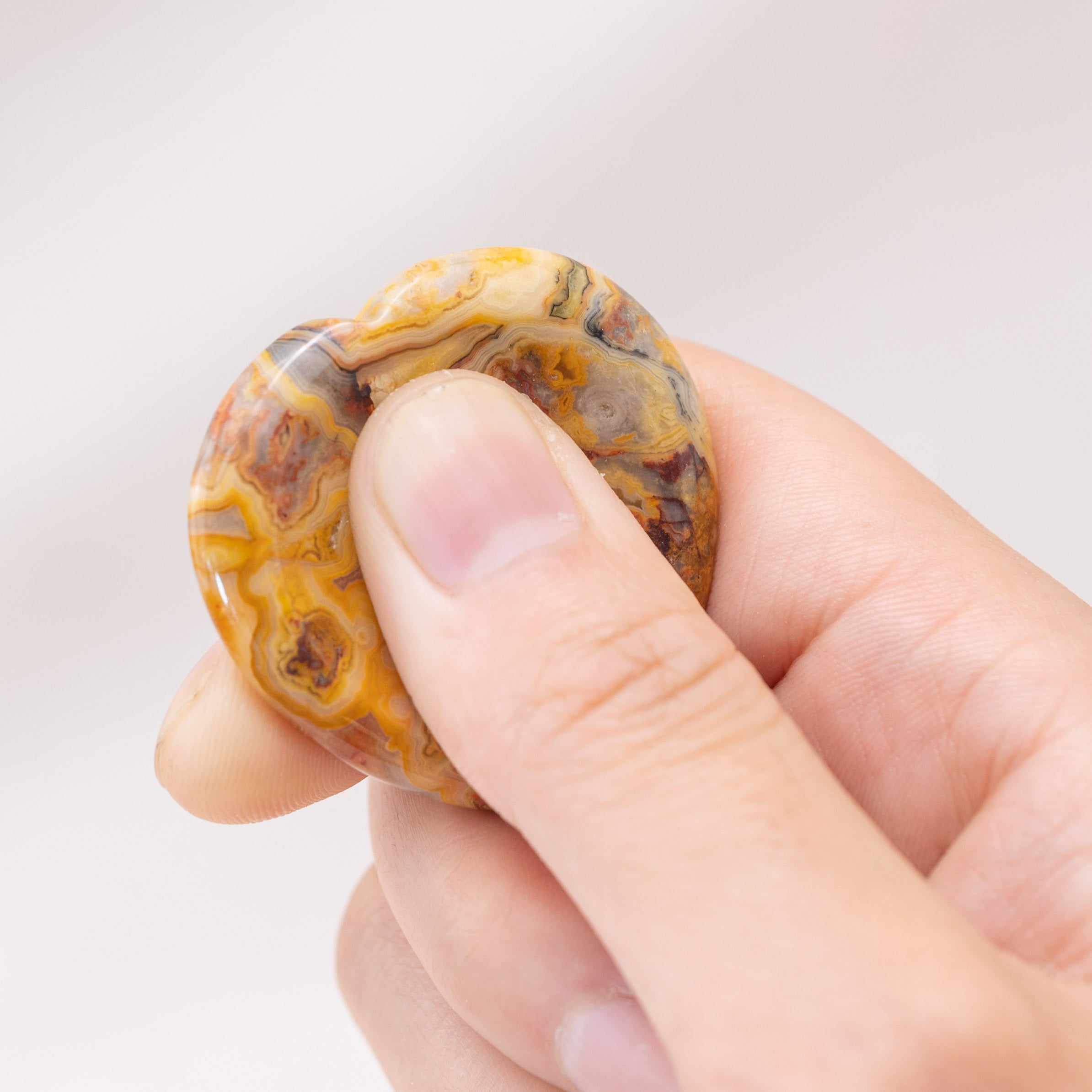 Enhance your mood with the Crazy Agate Heart Worry Stone, boosting confidence