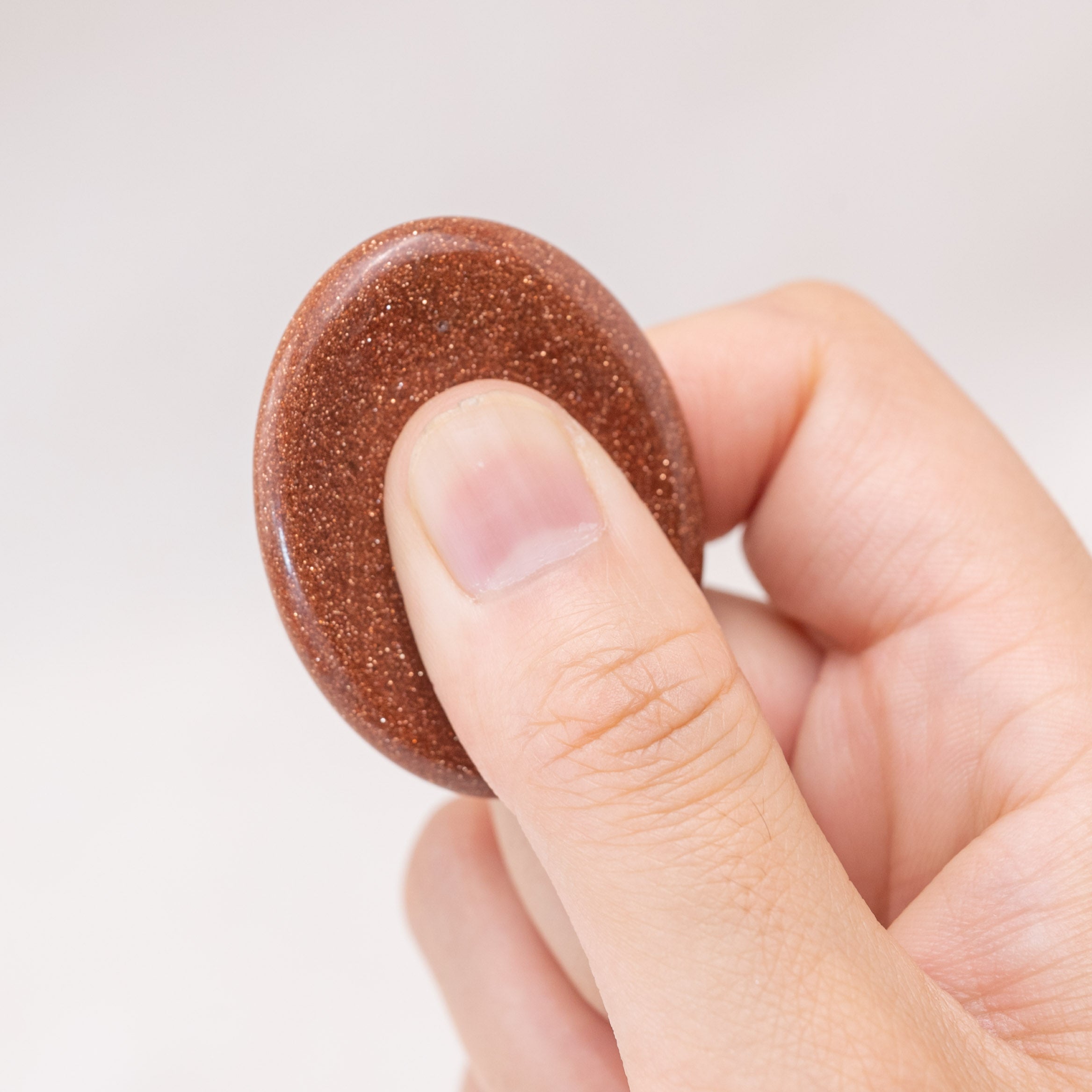 The Gold Sand Worry Stone is perfect for meditation and motivation