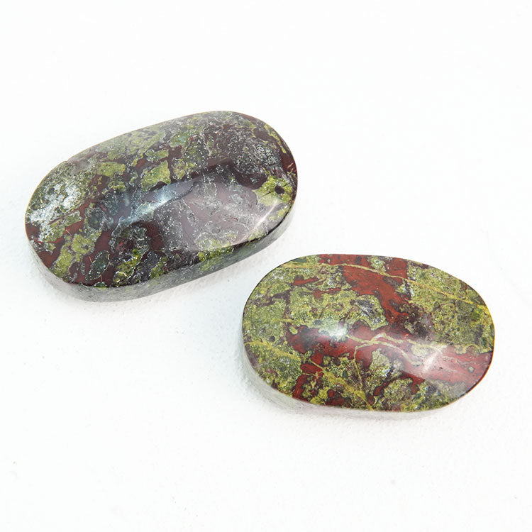 Dragon Blood Stone Palmstone, a symbol of protection and harmony