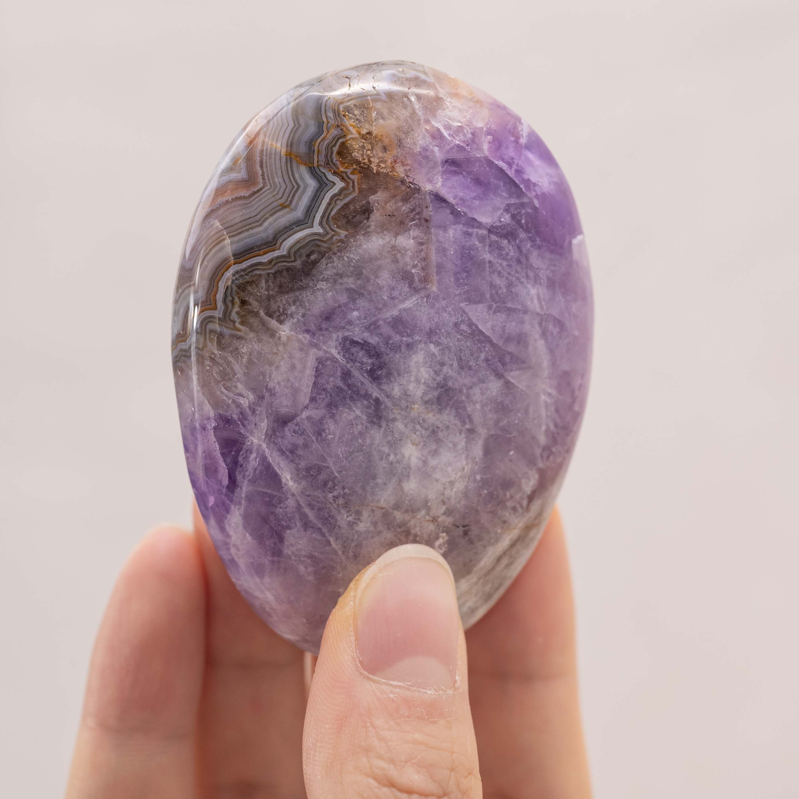 Amethyst Agate Palm Stone with beautiful purple hues and natural patterns