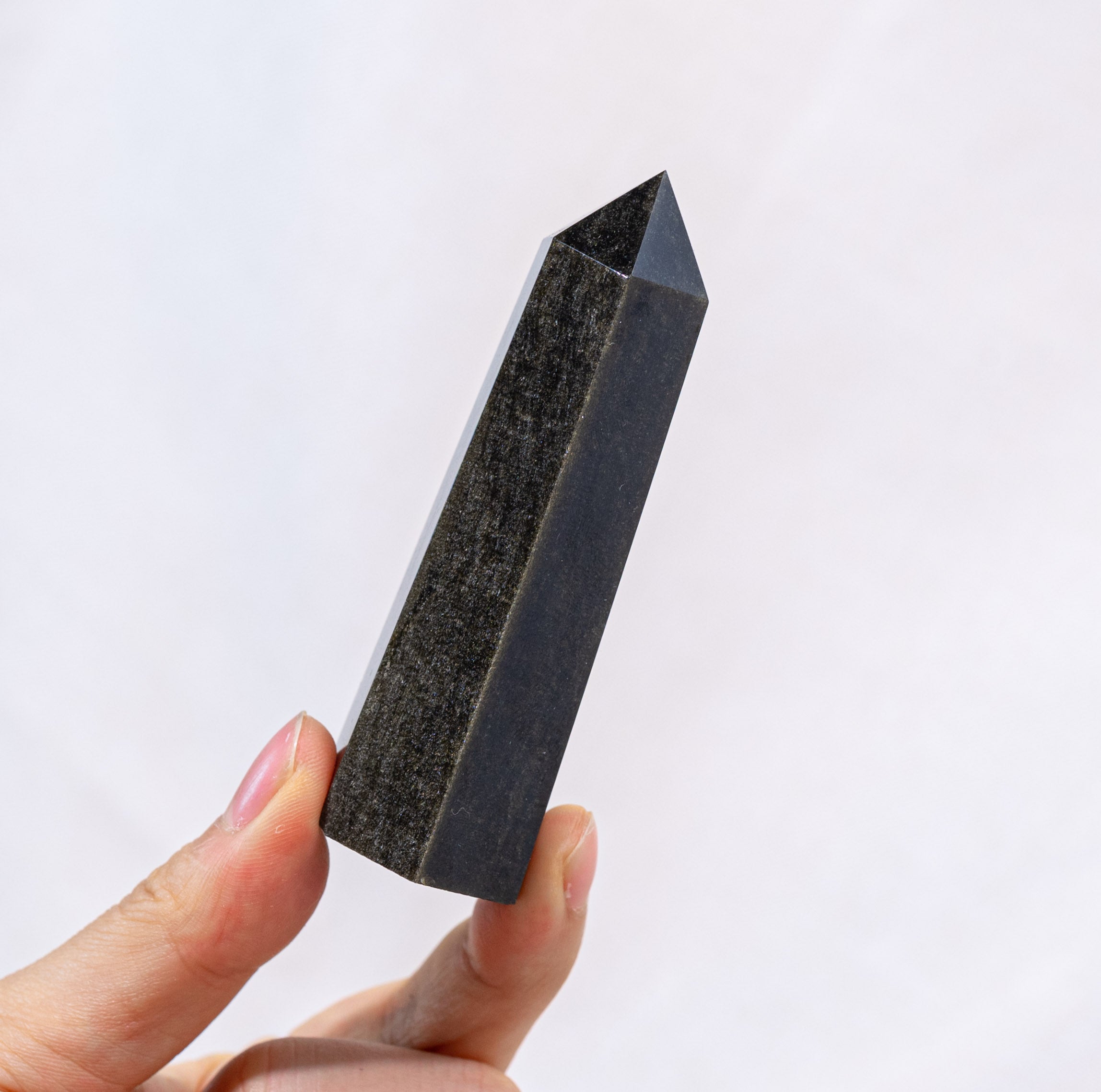 Flat lay of Golden Obsidian Point