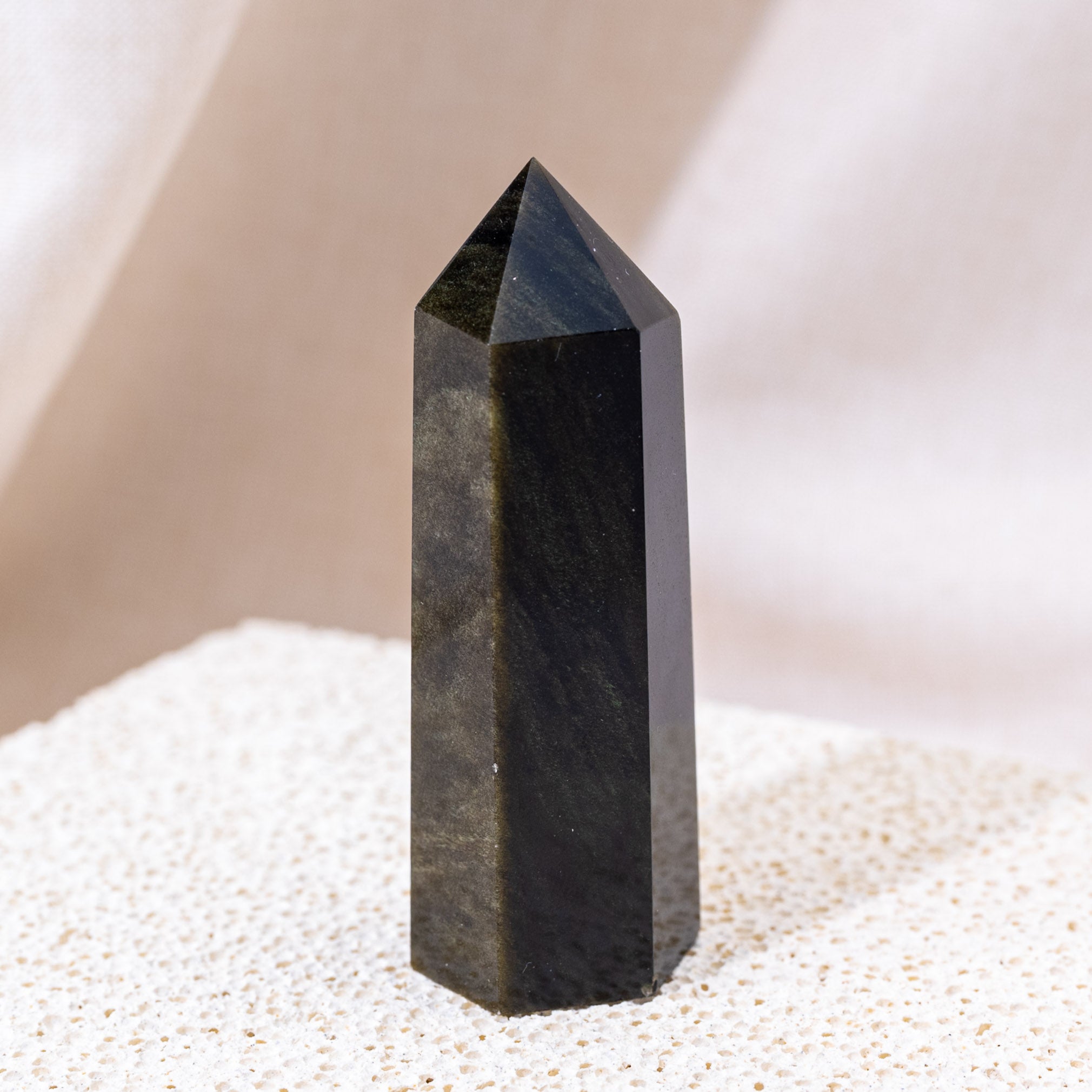 Detailed view of Golden Obsidian Point