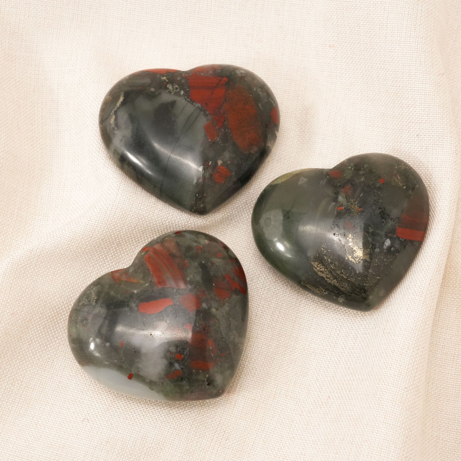Hand-carved Blood Stone Heart crystal for positive energy and courage