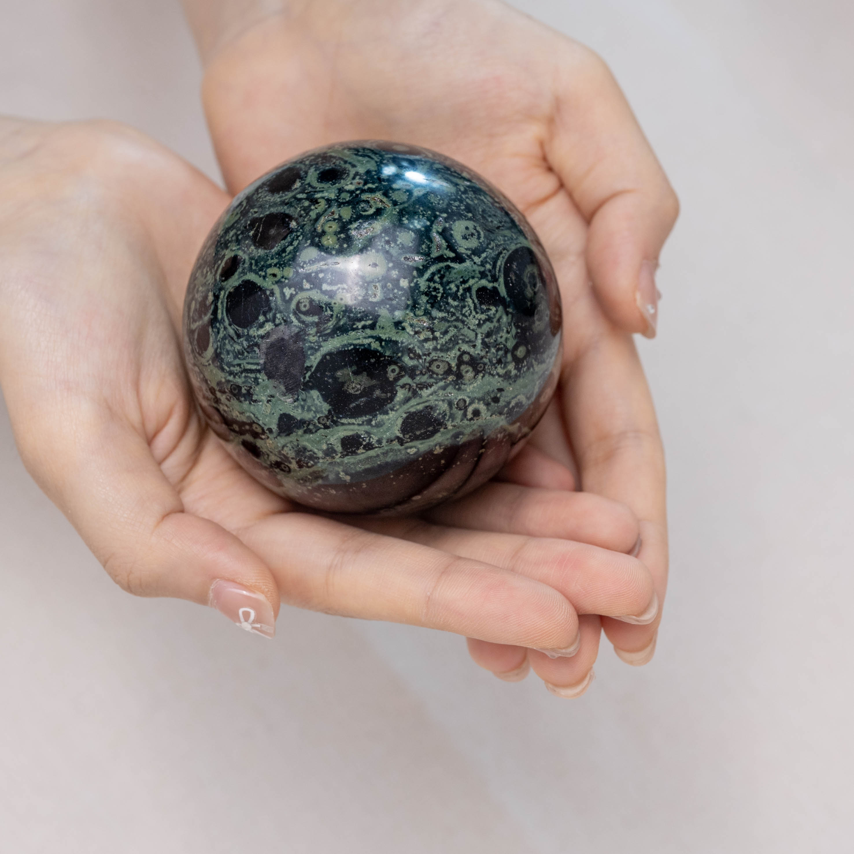 Hand-polished Kambaba Jasper Sphere for grounding