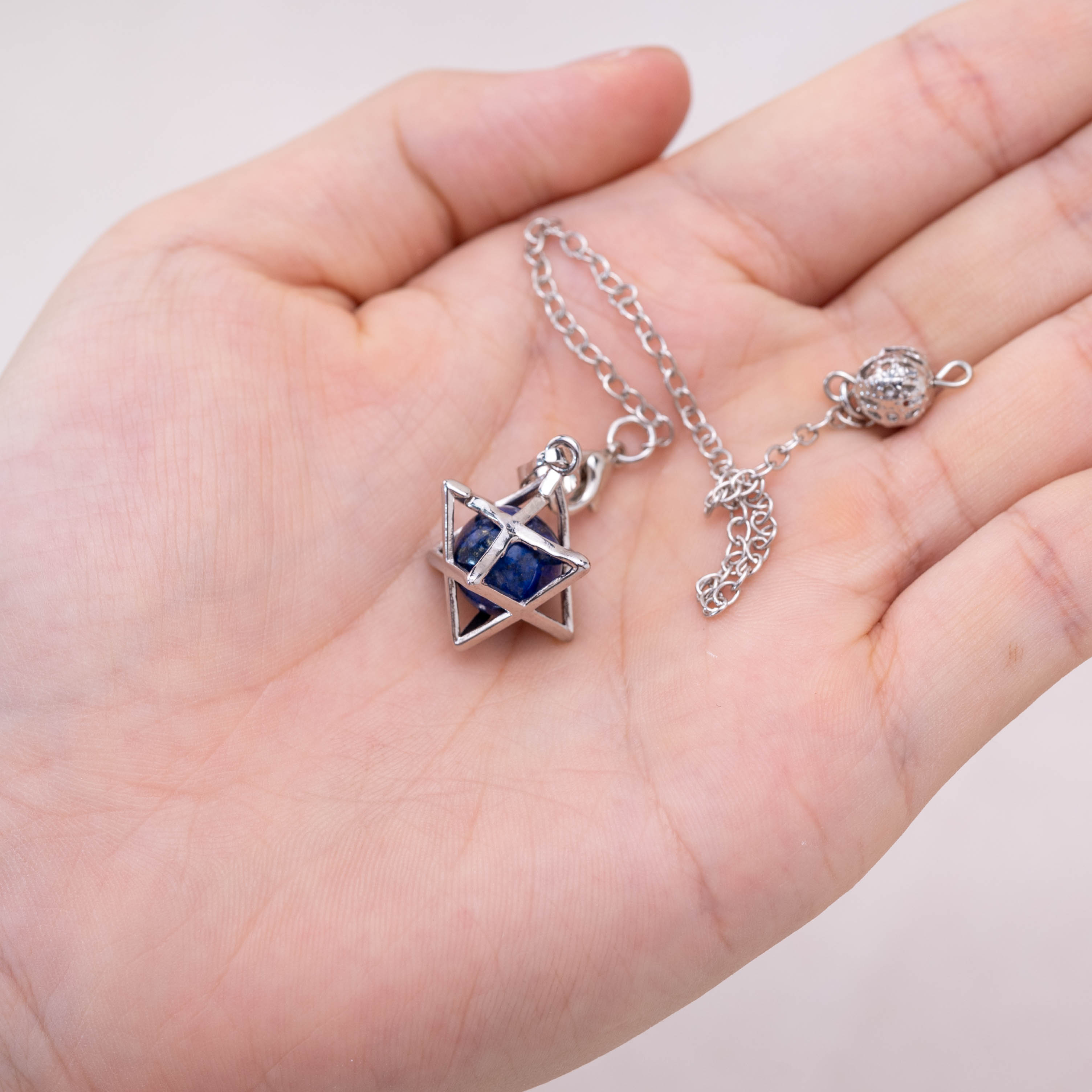 Elegant Lapis Lazuli Merkaba pendulum for balance and harmony