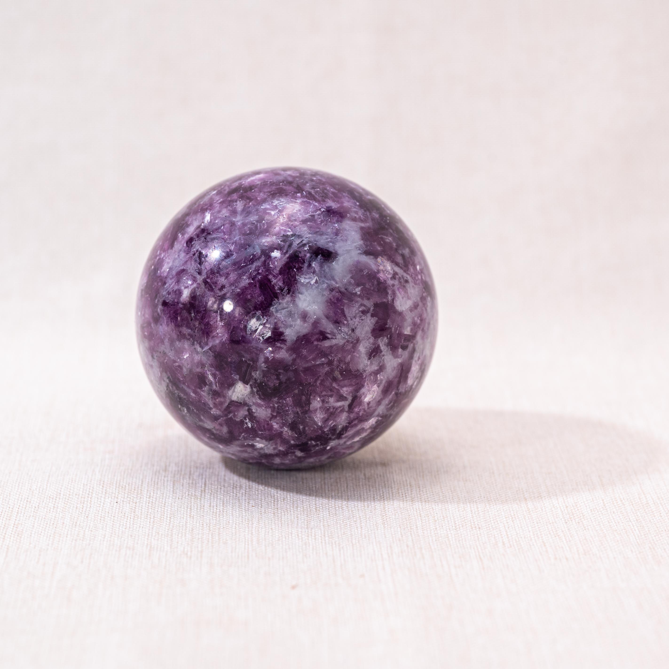 The Lepidolite Sphere balances your emotions.