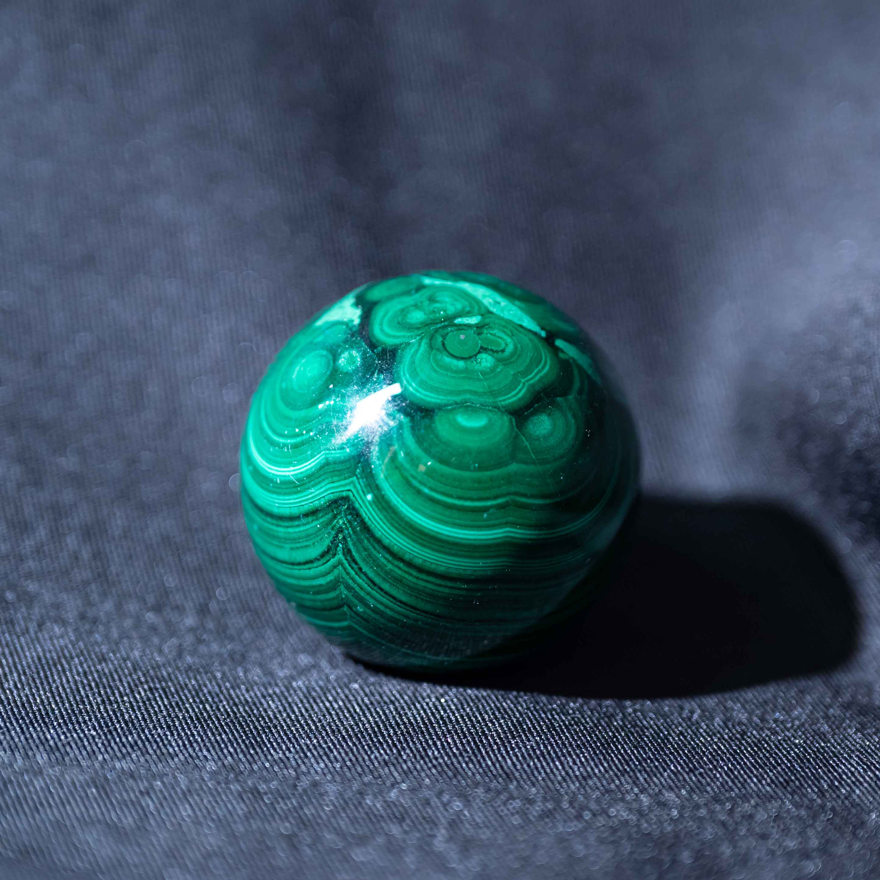 Enhance your meditation practice with the calming energy of this Malachite Sphere.