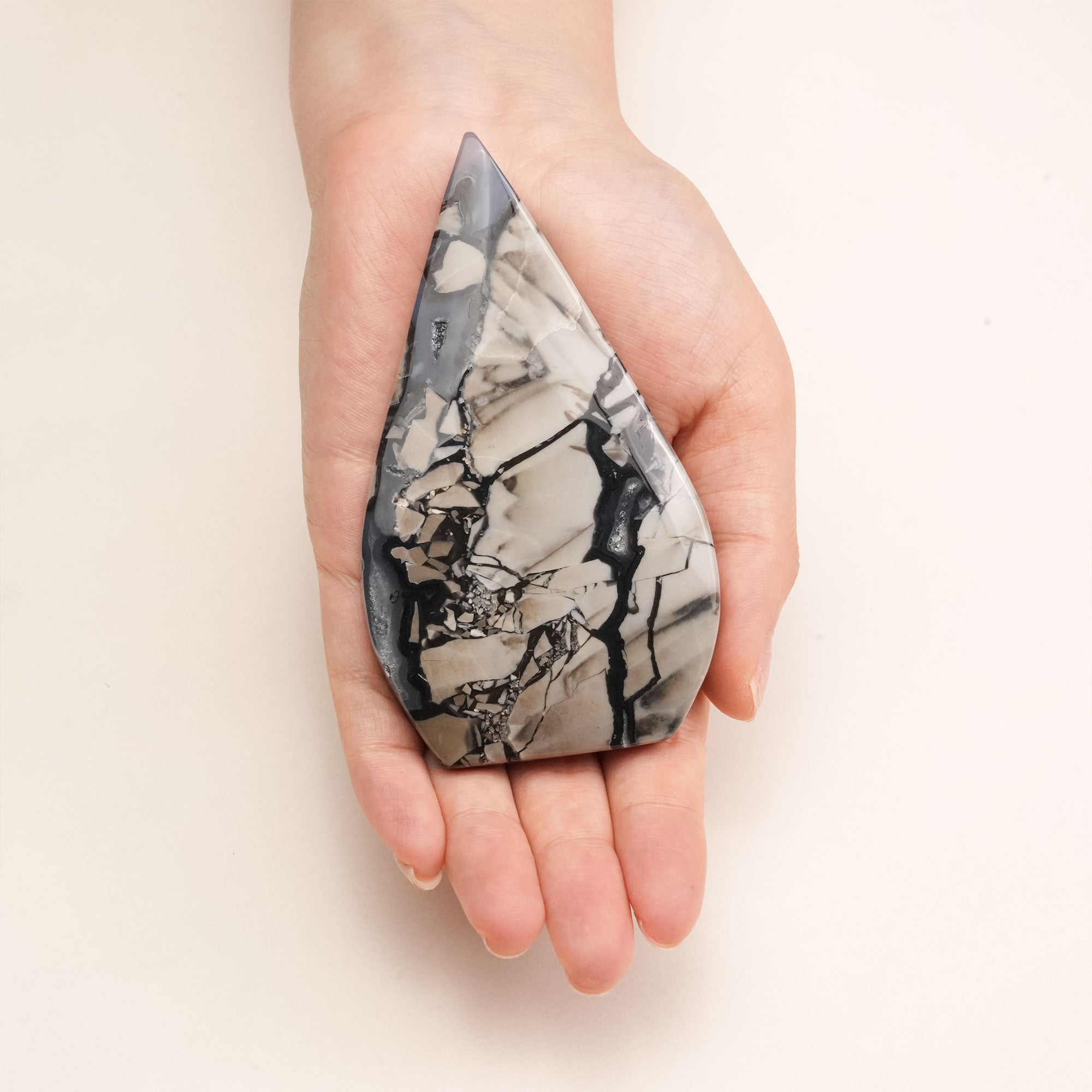 Assorted collection of Volcanic Agate Freeform Crystals, showcasing a variety of shapes and sizes available