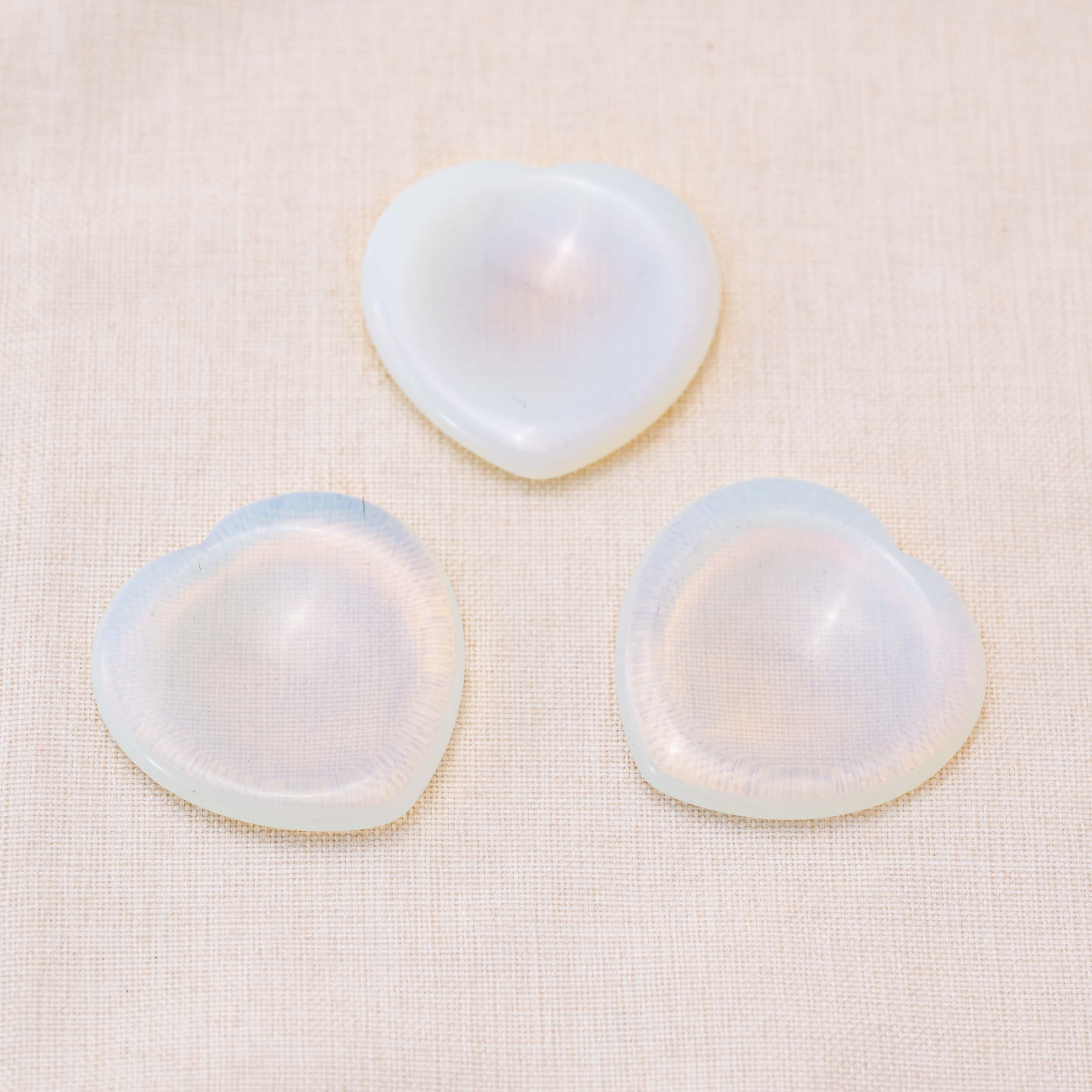Use the Opalite Heart Worry Stone for emotional healing and spiritual growth