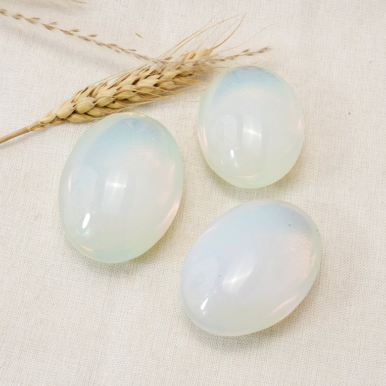 Opalite Palm Stone crystal for aura protection and spiritual awareness