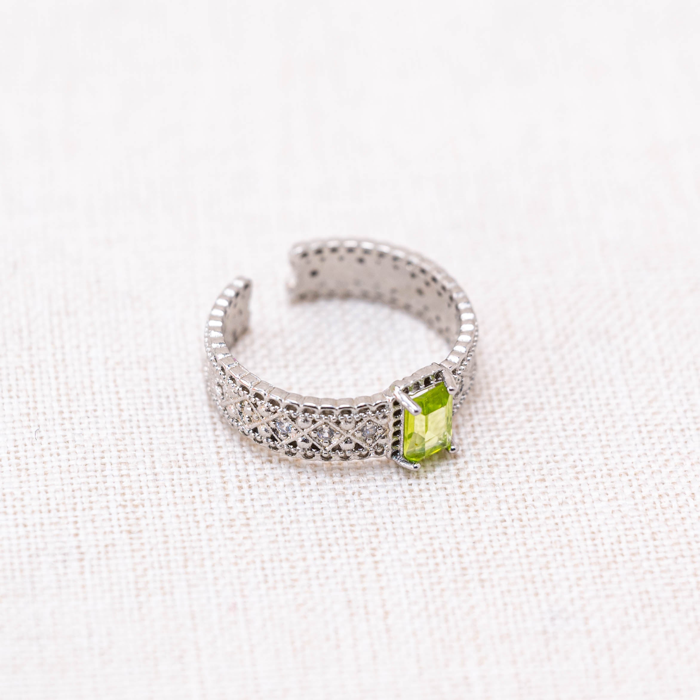 Stunning Peridot Cube Ring, symbolizing prosperity.