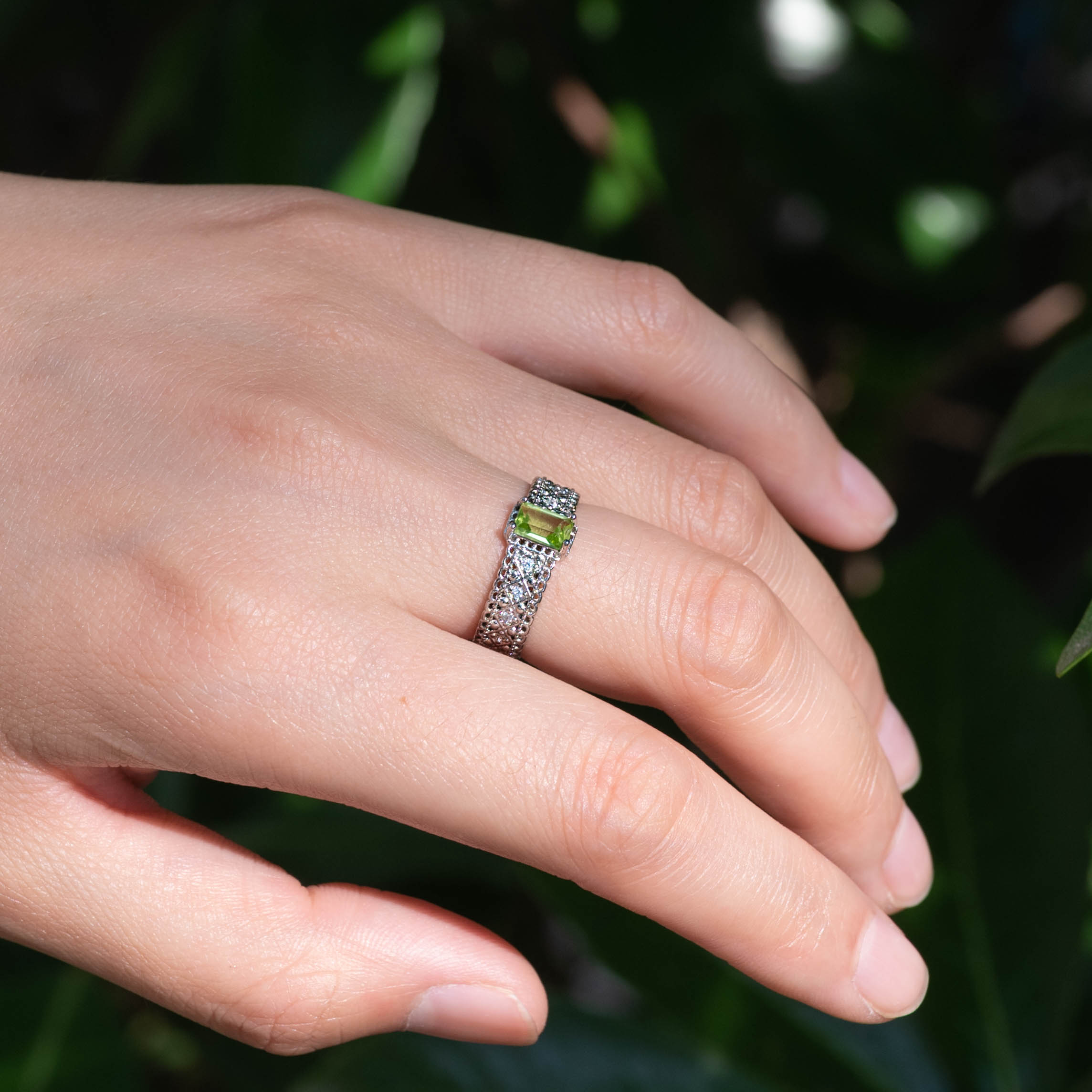 Peridot Cube Ring with a modern design.
