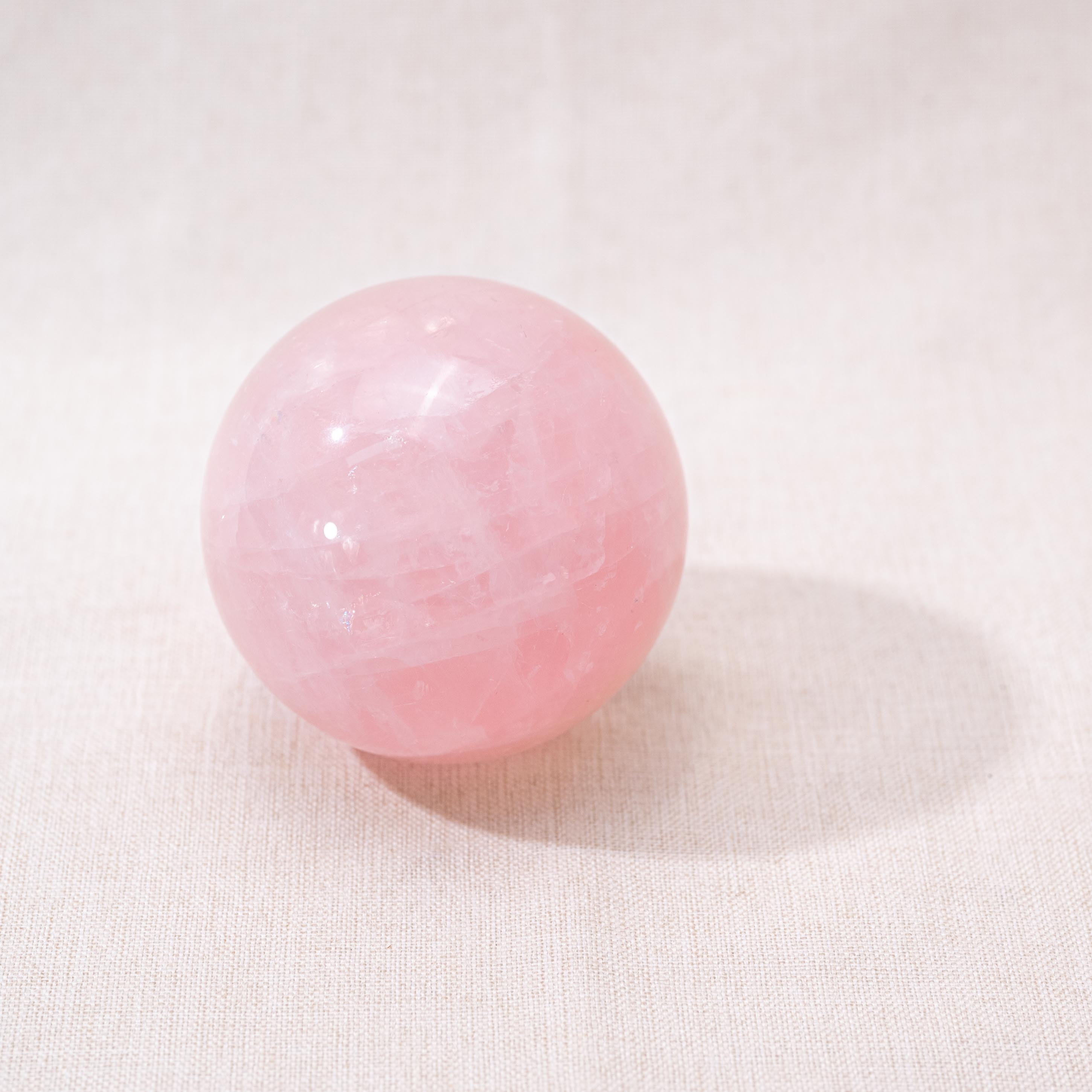 Decorative Rose Quartz Sphere with soothing pink tones for harmony