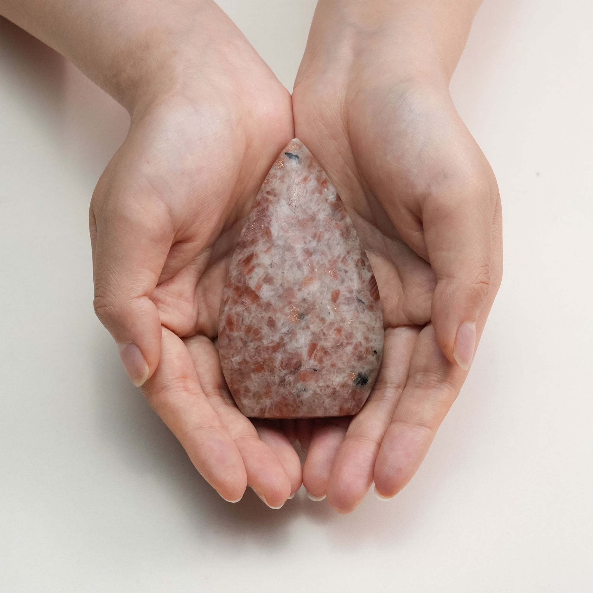 Handcrafted Sun Stone ring, showcasing its fiery glow