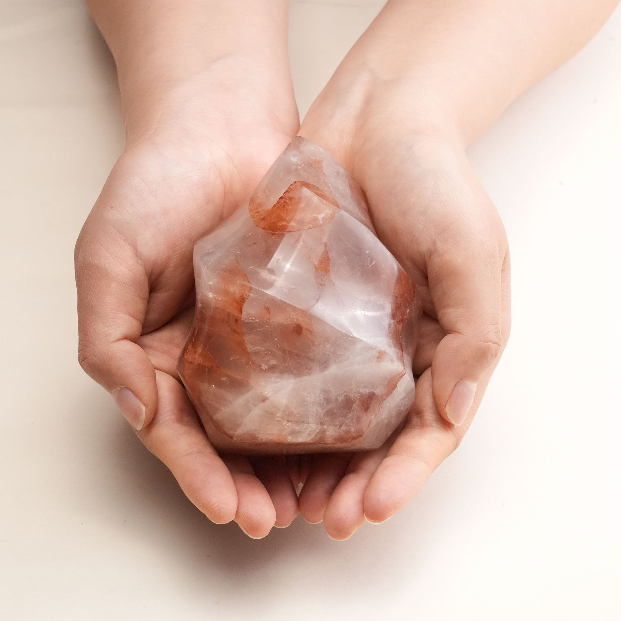 Flame-shaped Red Fire Quartz crystal provides grounding stability