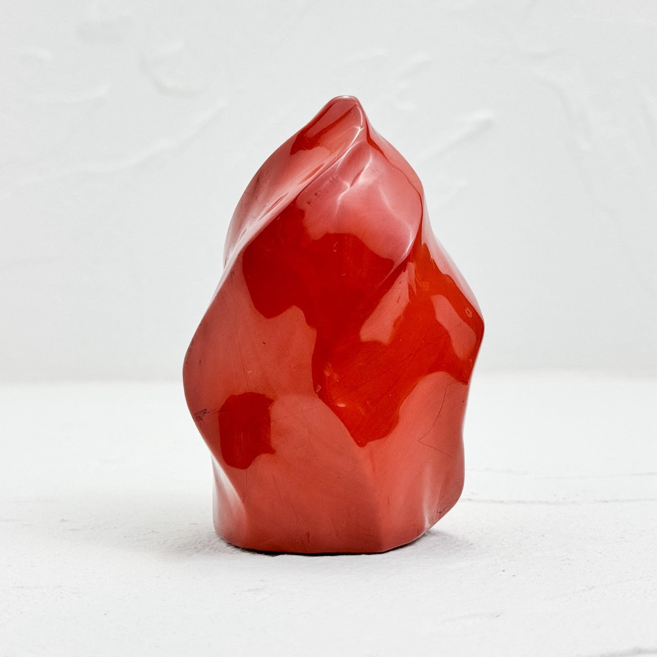 Hand-holding Red Jasper Flame during meditation for grounding