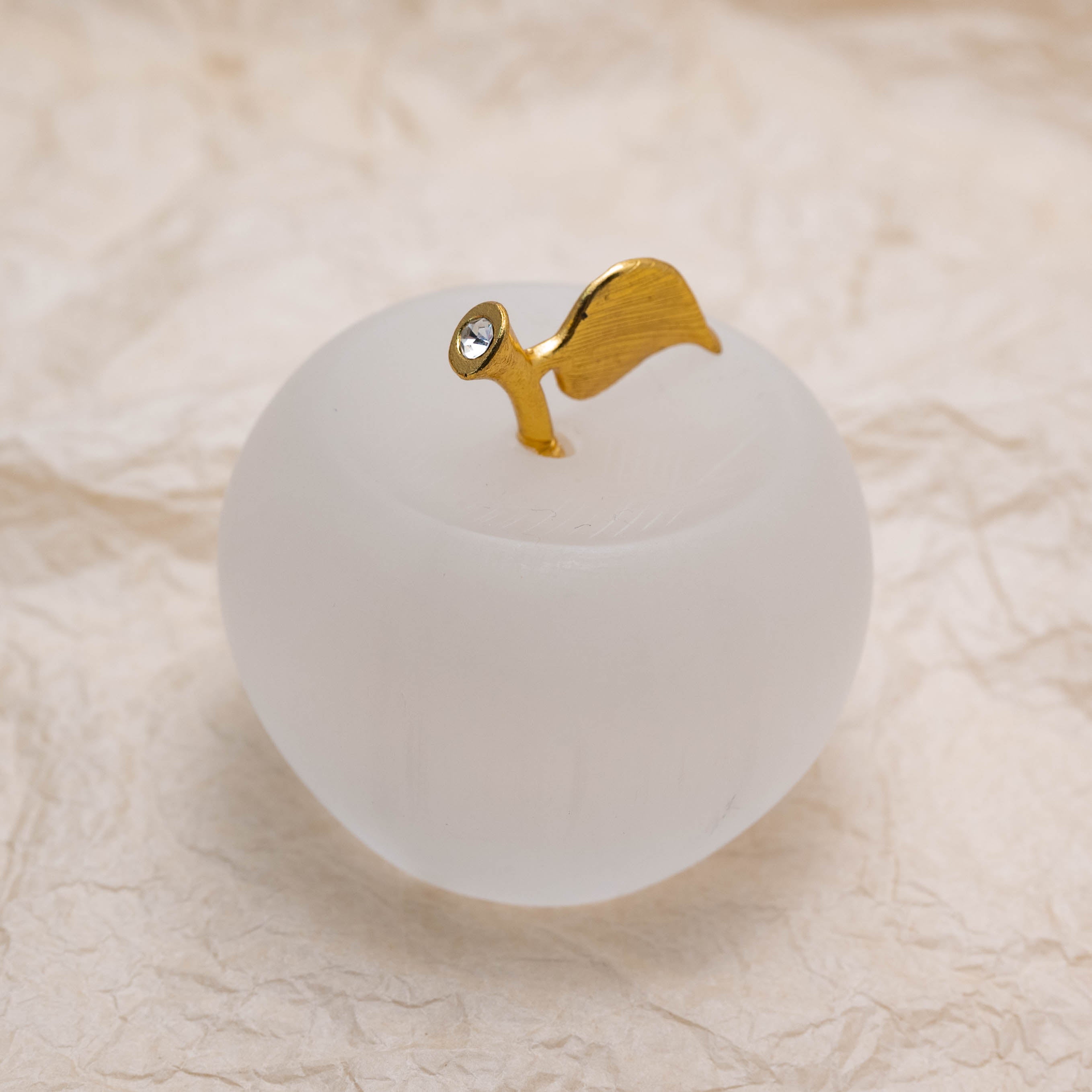 The Selenite Apple Carving cleanses your space of negative energy.