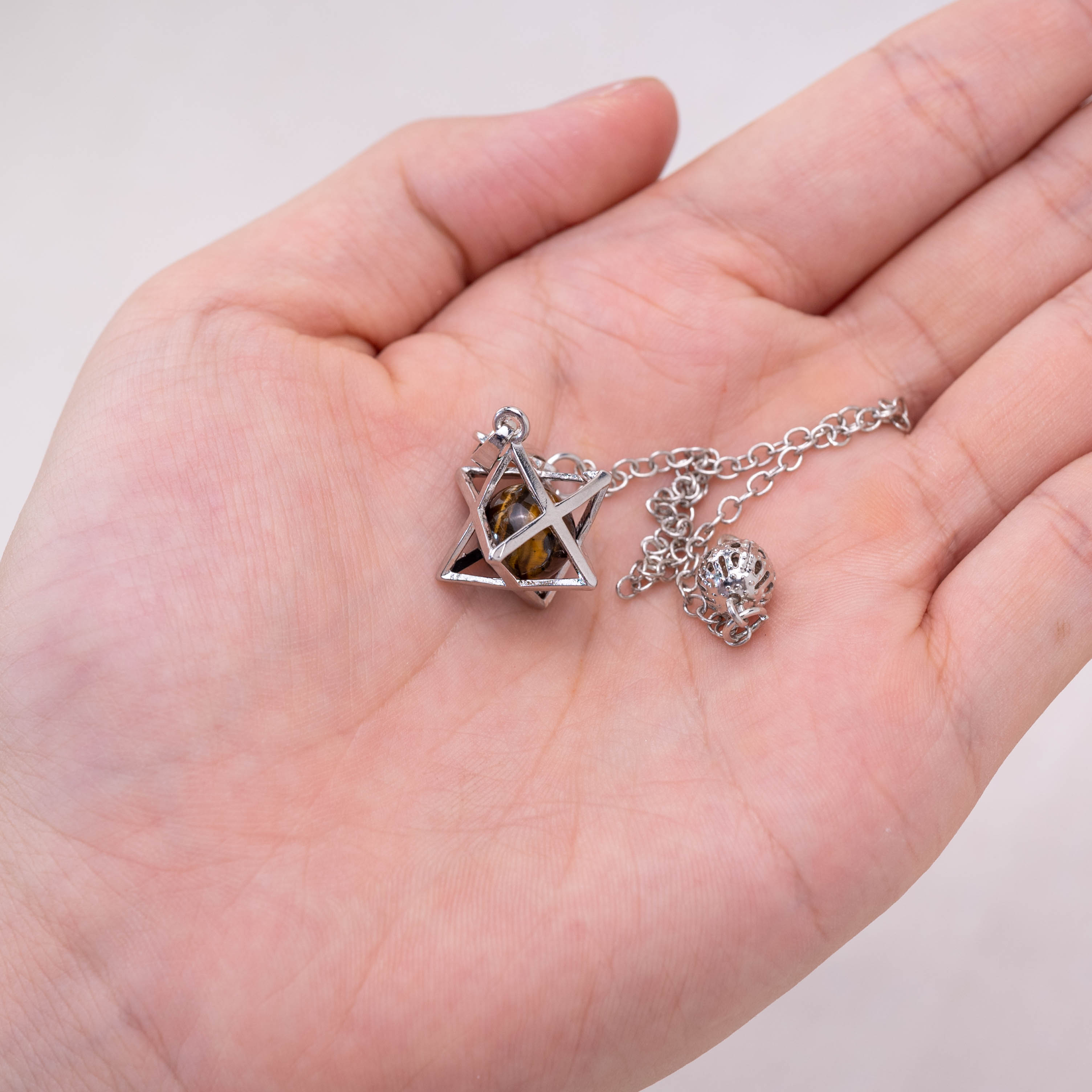 Tiger Eye Merkaba pendulum enhancing courage