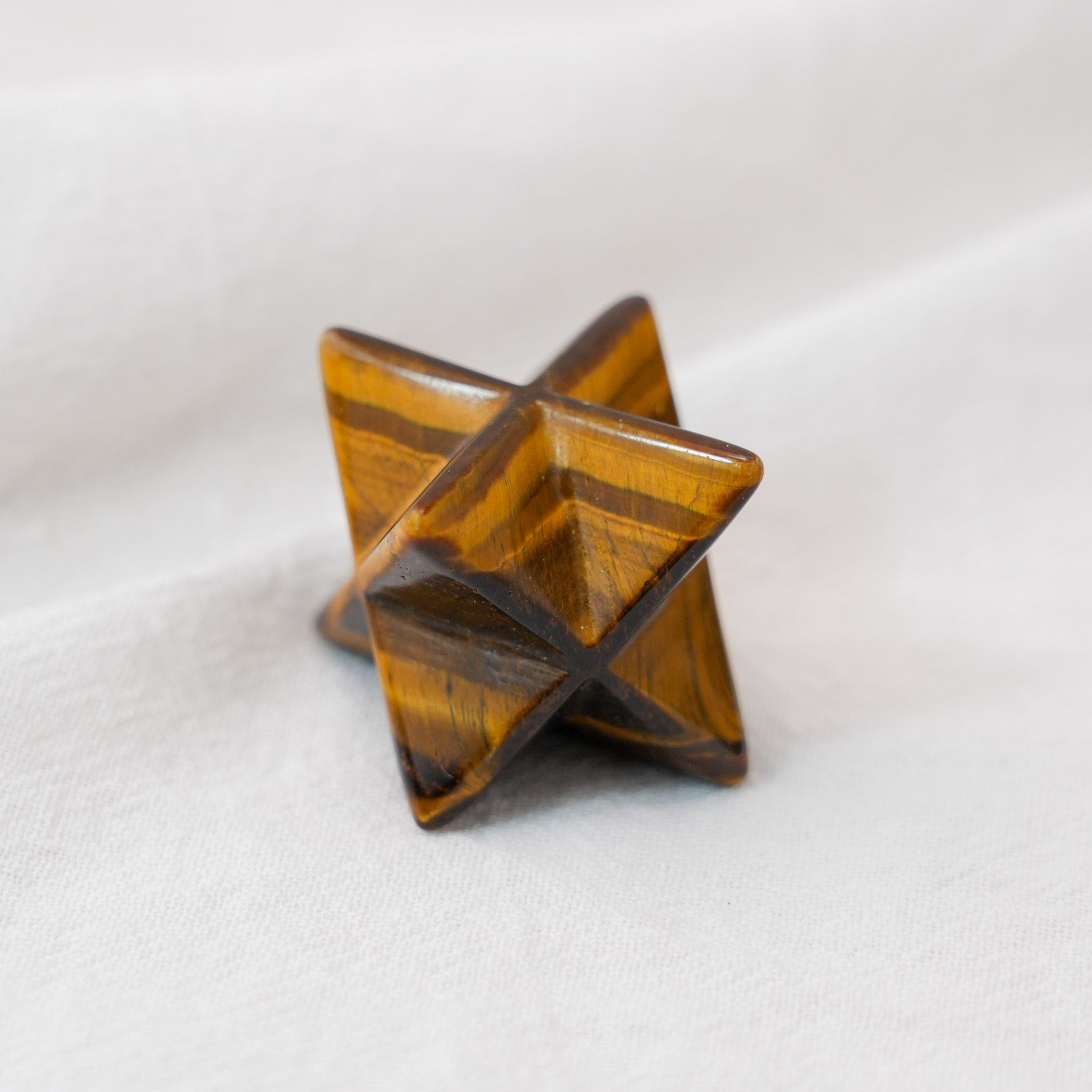 Tiger Eye Merkaba, a powerful gemstone for energy protection and focus