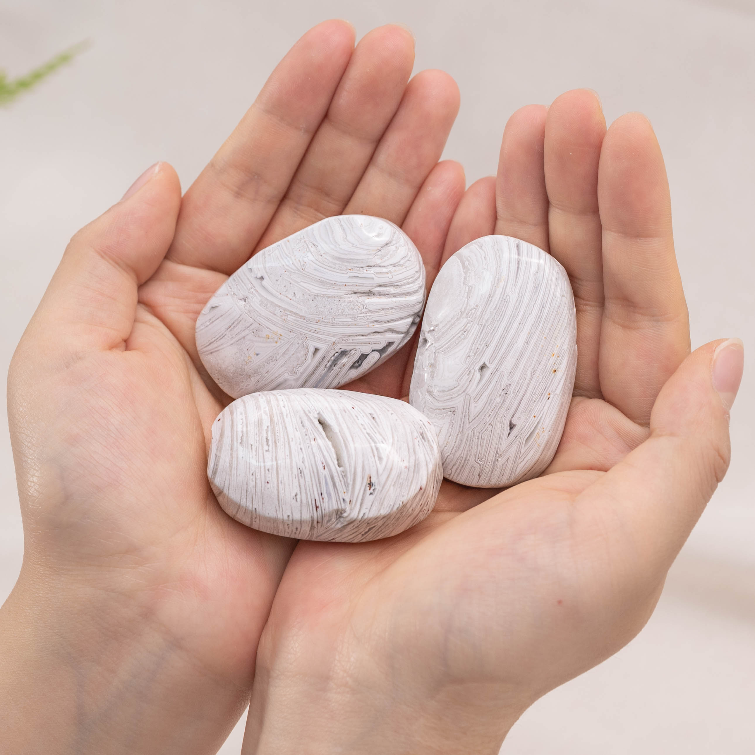 White Mexico Agate Palmstone: A unique natural crystal that helps balance body and mind