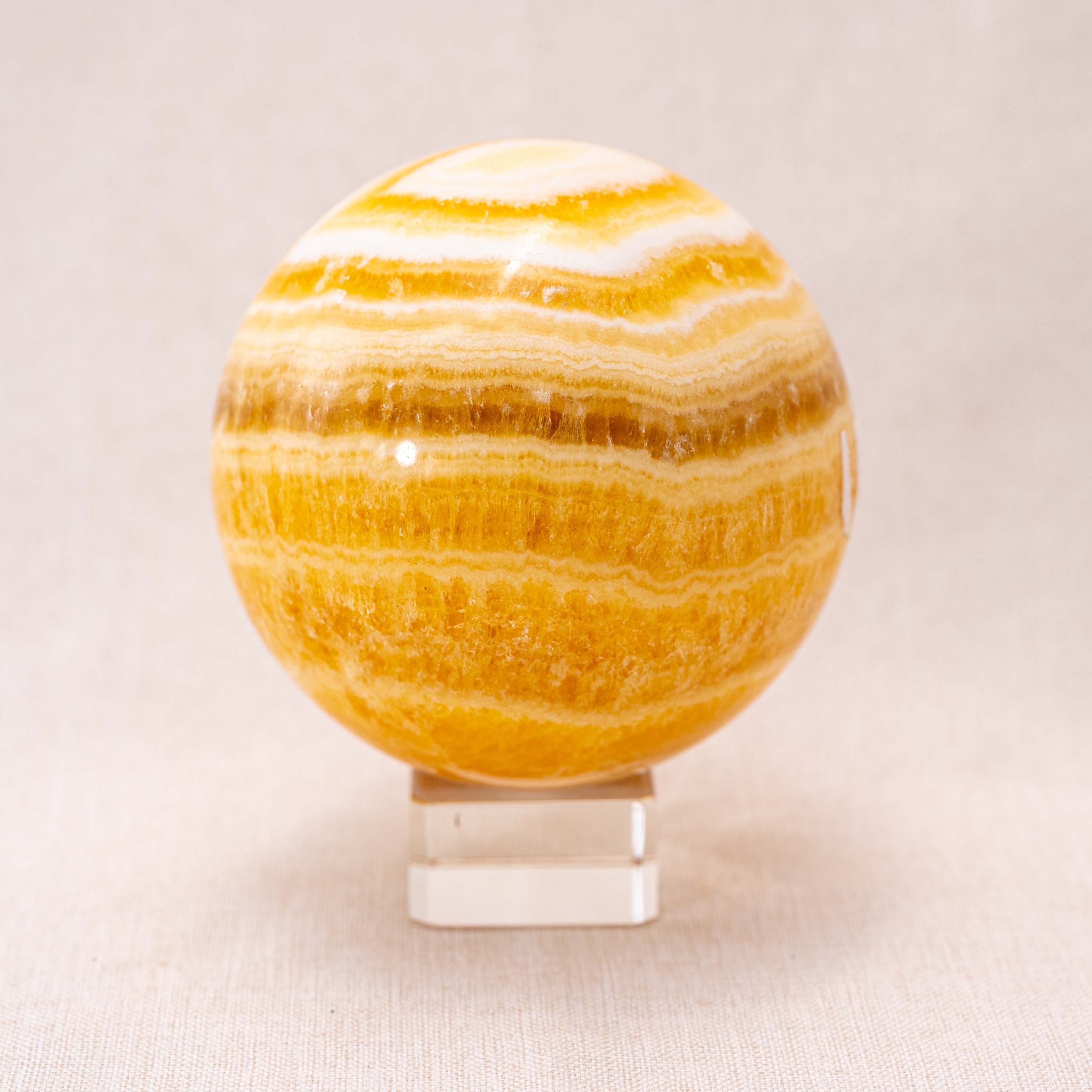 Yellow Calcite Sphere with vibrant yellow tones