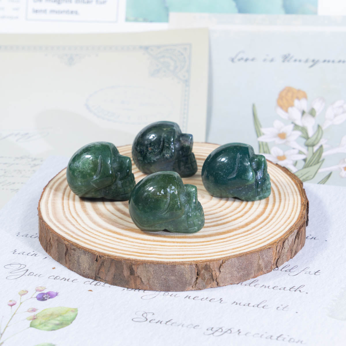 1-Inch Moss Agate Skull In Bulk