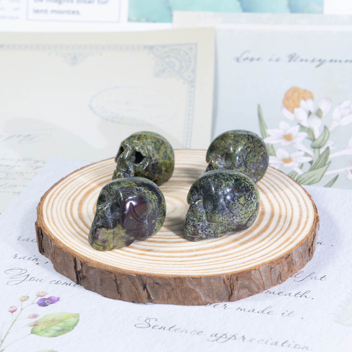 1-Inch Dragon Blood Stone Skull In Bulk