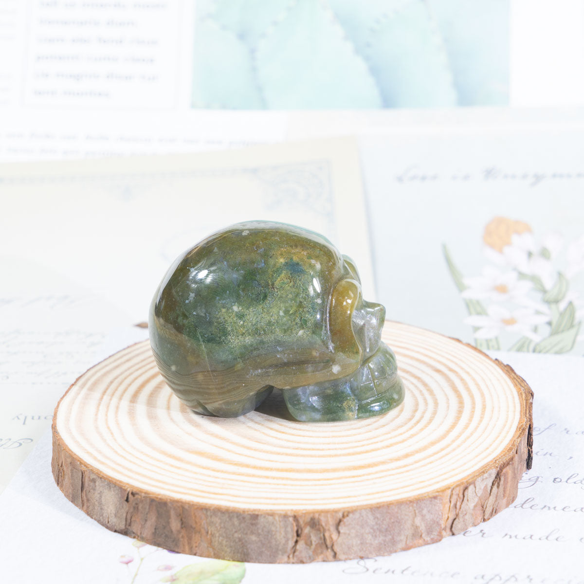 2-Inch Moss Agate Skull In Bulk