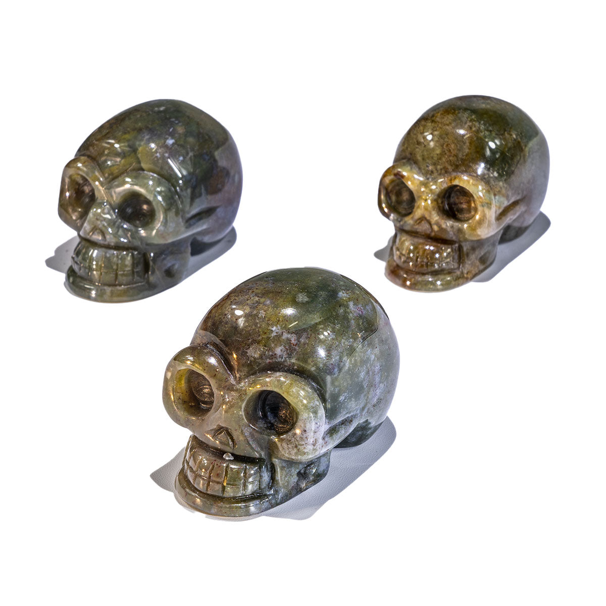 2-Inch Moss Agate Skull In Bulk