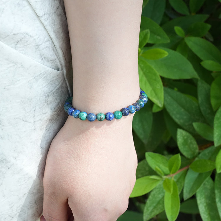 girl wearing chrysocolla lapiz bracelet