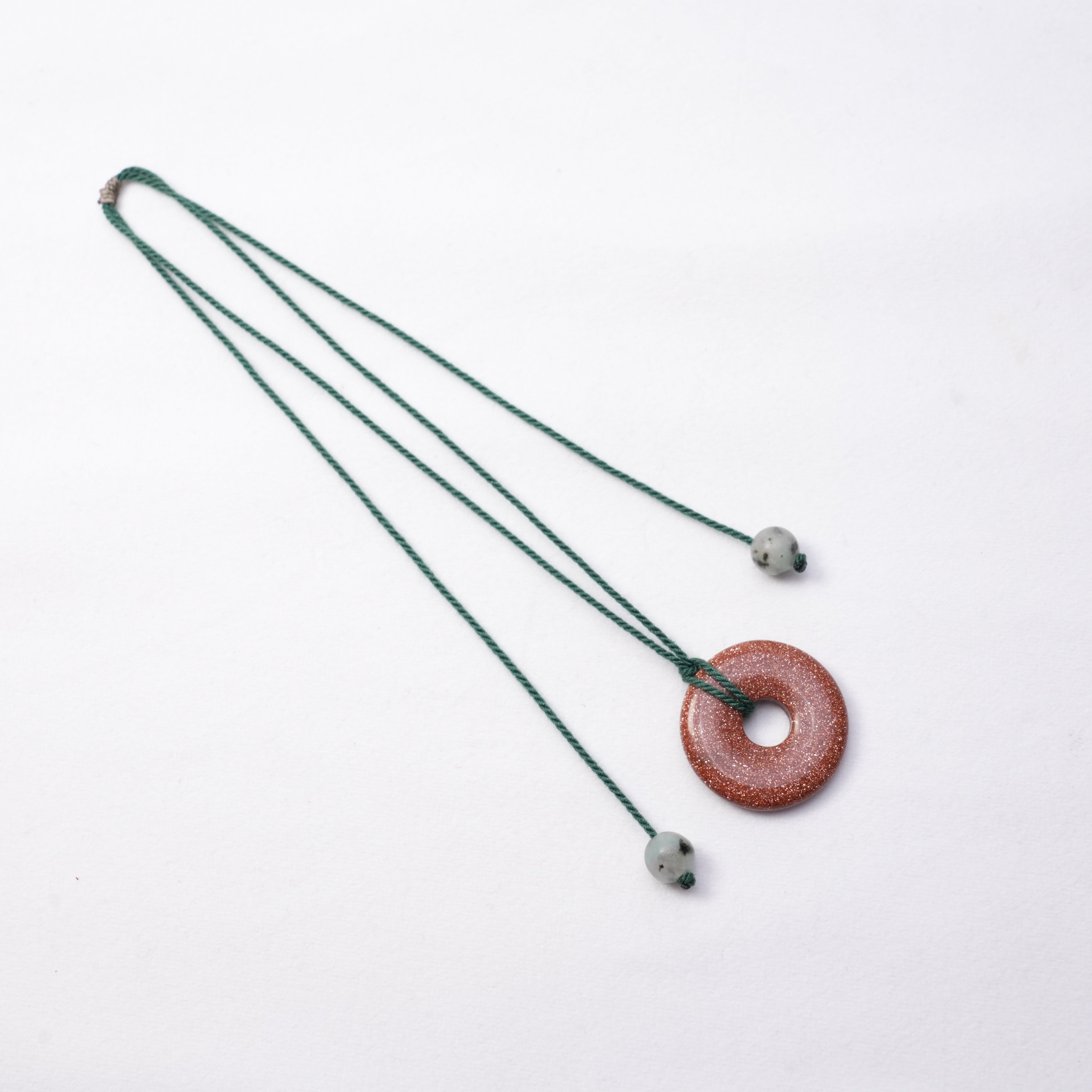 Gold Sand Stone Peace Knot Necklace