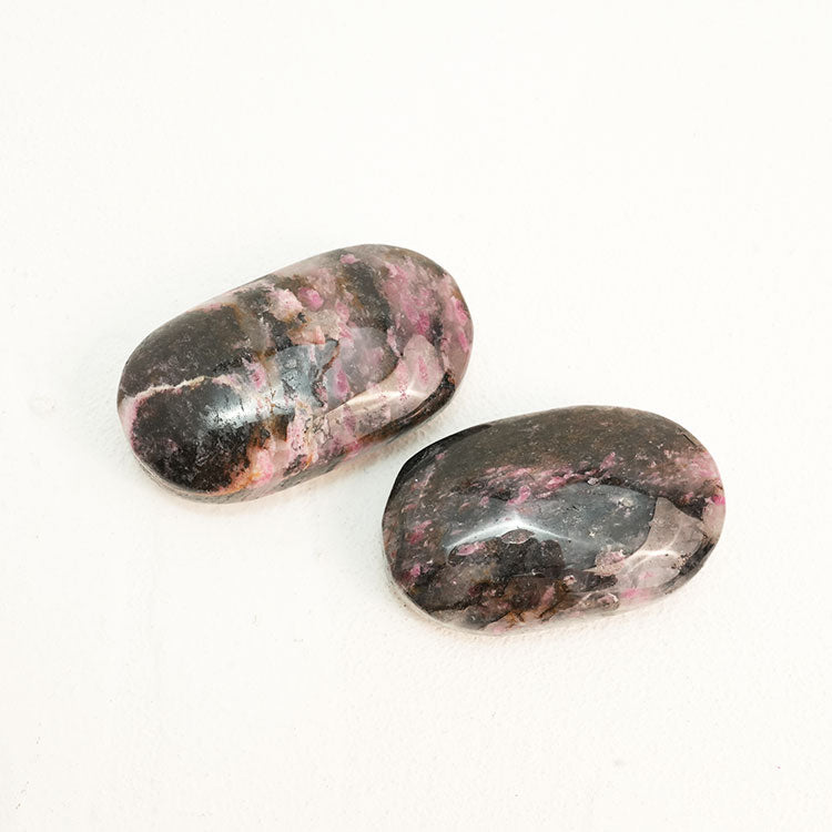 Soothing Black Rhodonite Palmstone for Stress Relief