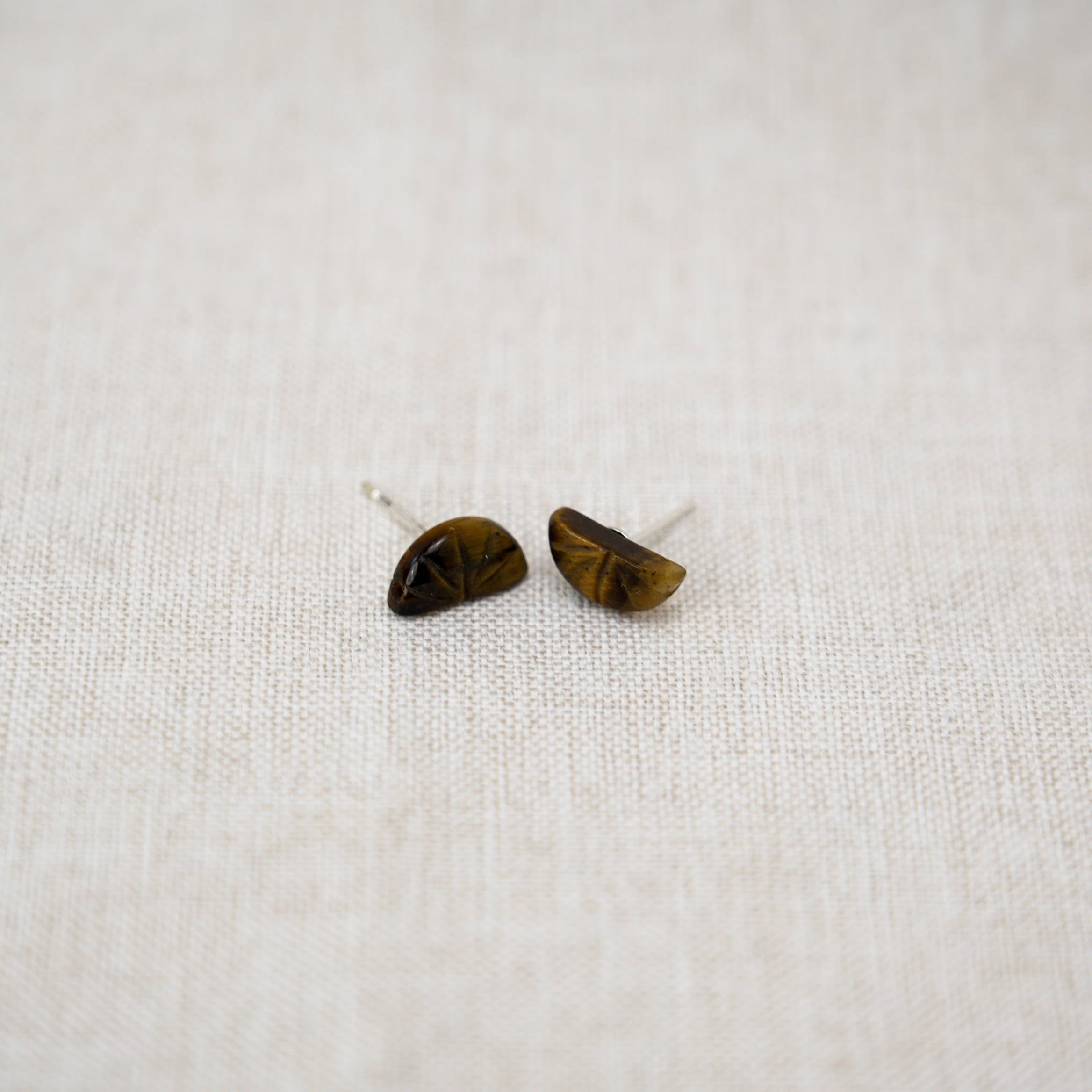 Exquisite handcrafted tiger eye stone stud earrings, ideal for both everyday wear and special occasions.