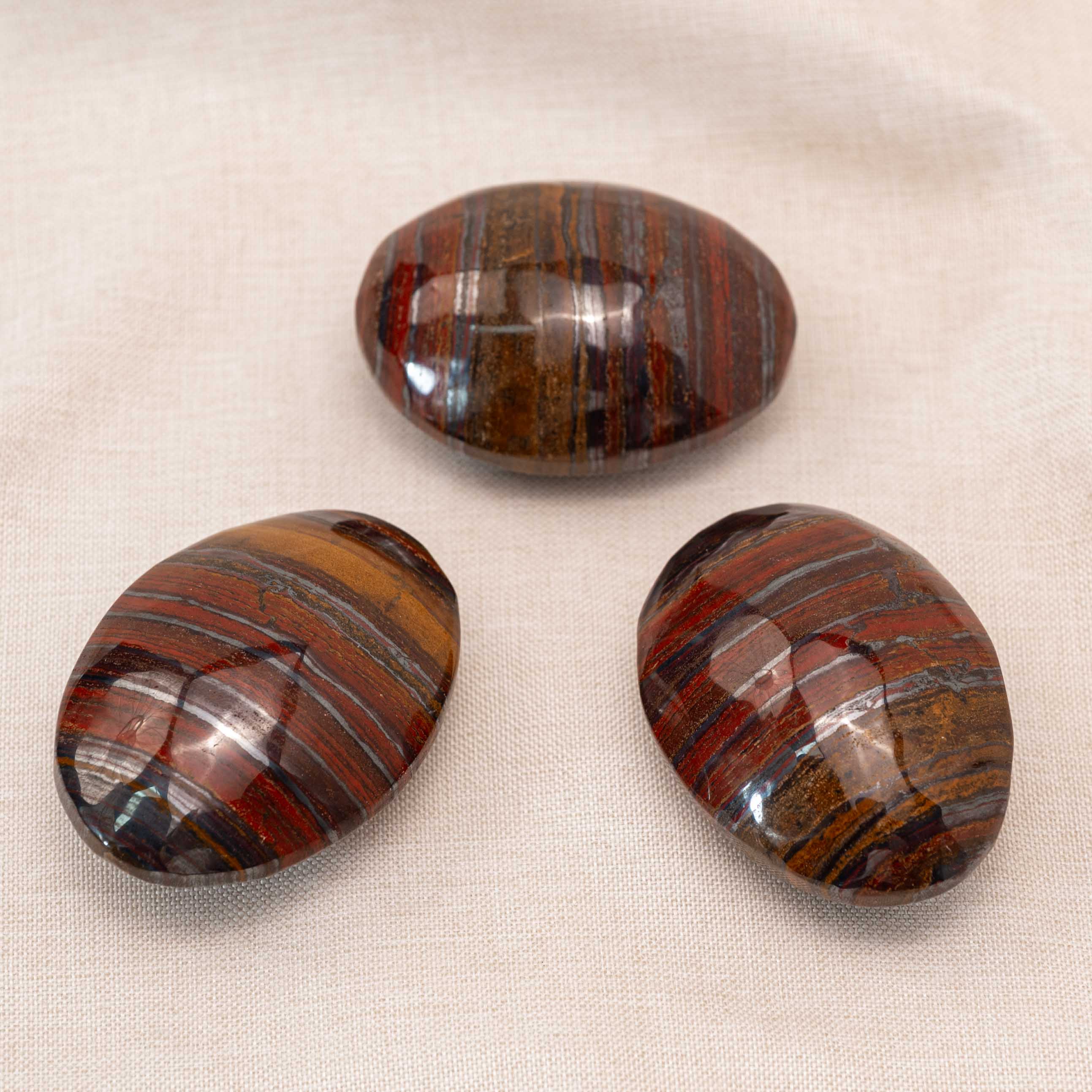Iron Tiger Eye Stone Palm Stone promoting balance and protection