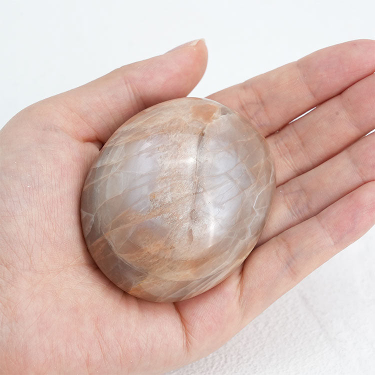 Orange MoonStone Palm Stone, handcrafted for energy alignment and emotional balance