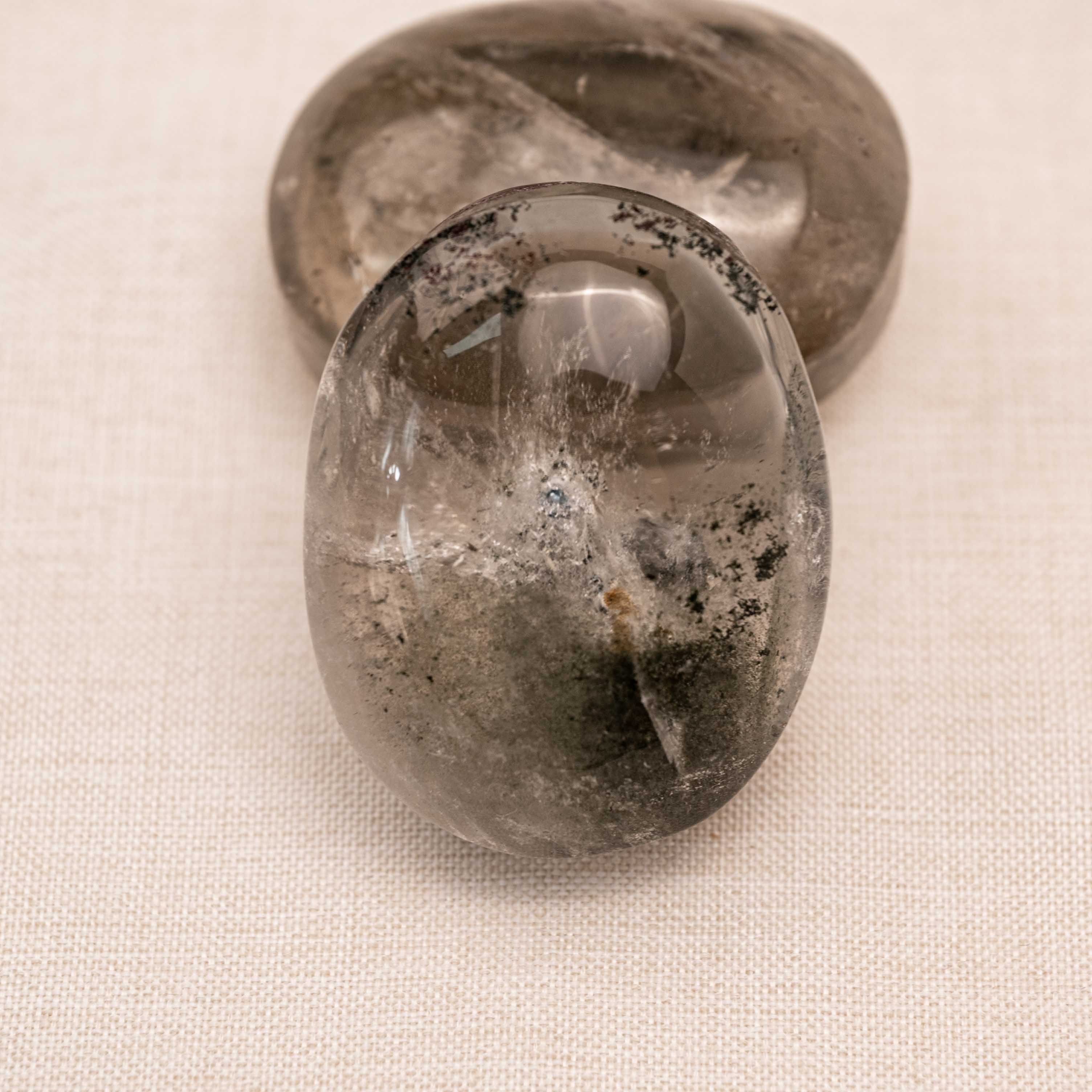 Harmonious Phantom Quartz Palmstone promoting emotional stability