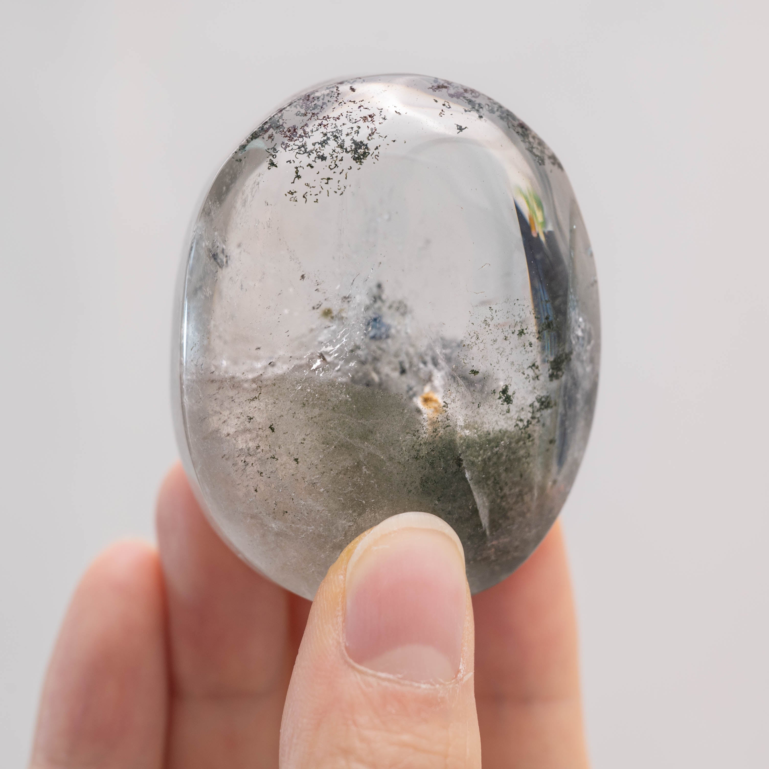 Serene Phantom Quartz Palmstone for meditation and relaxation