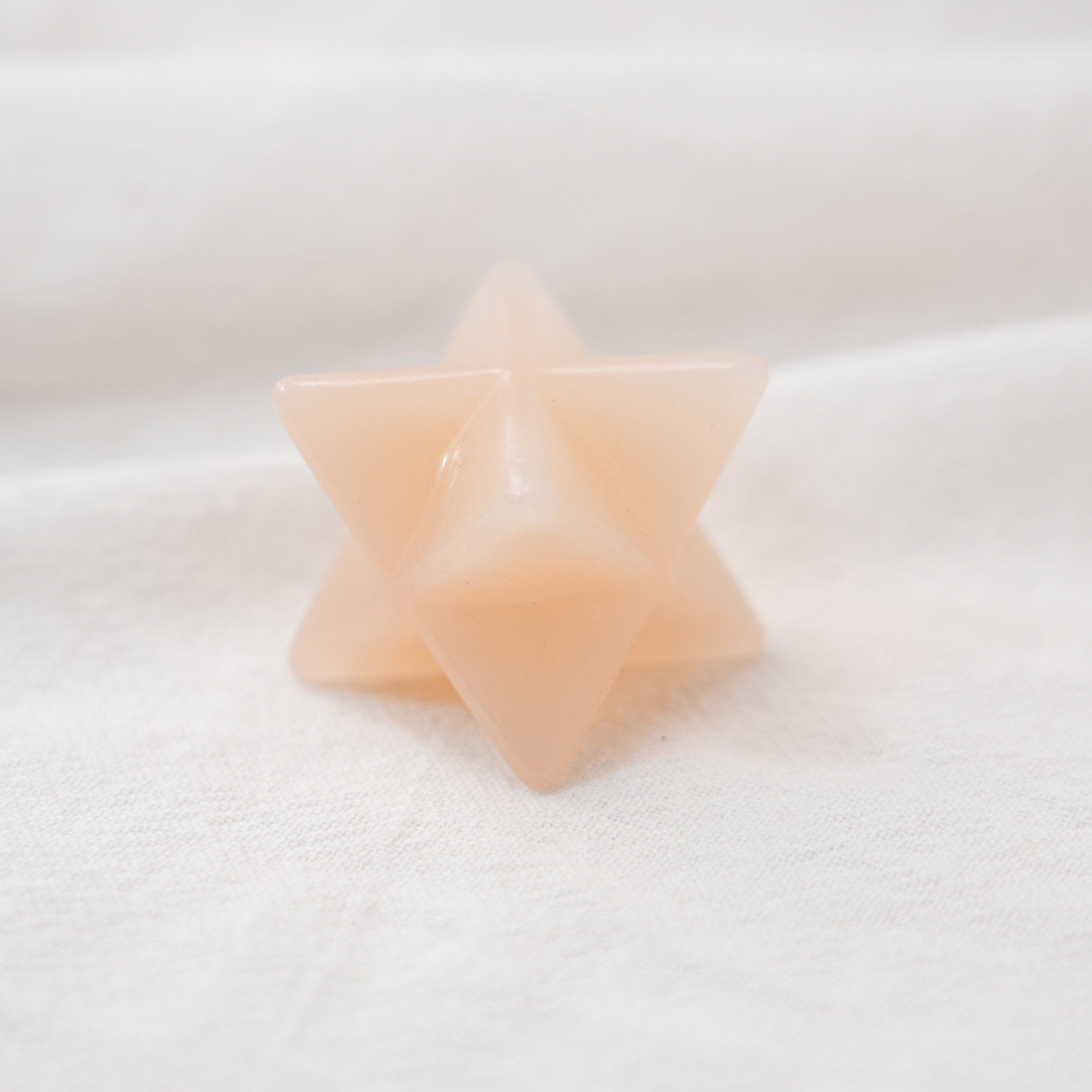 Pink Aventurine Merkaba star, perfect for meditation and spiritual growth