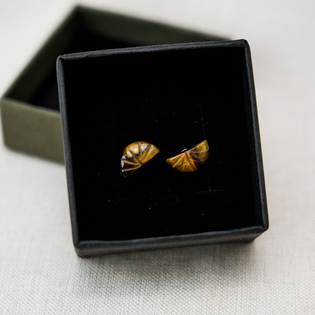 Beautiful tiger eye stone drop earrings that add a touch of elegance and charm to any ensemble.