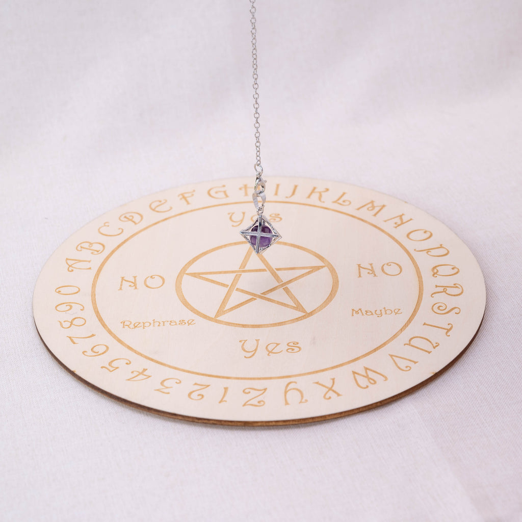 Detailed view of Amethyst Merkaba-shaped pendulum